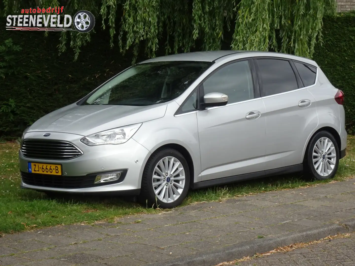 Ford C-Max 1.0 125pk Titanium met Navi, Camera en Trekhaak Grau - 1