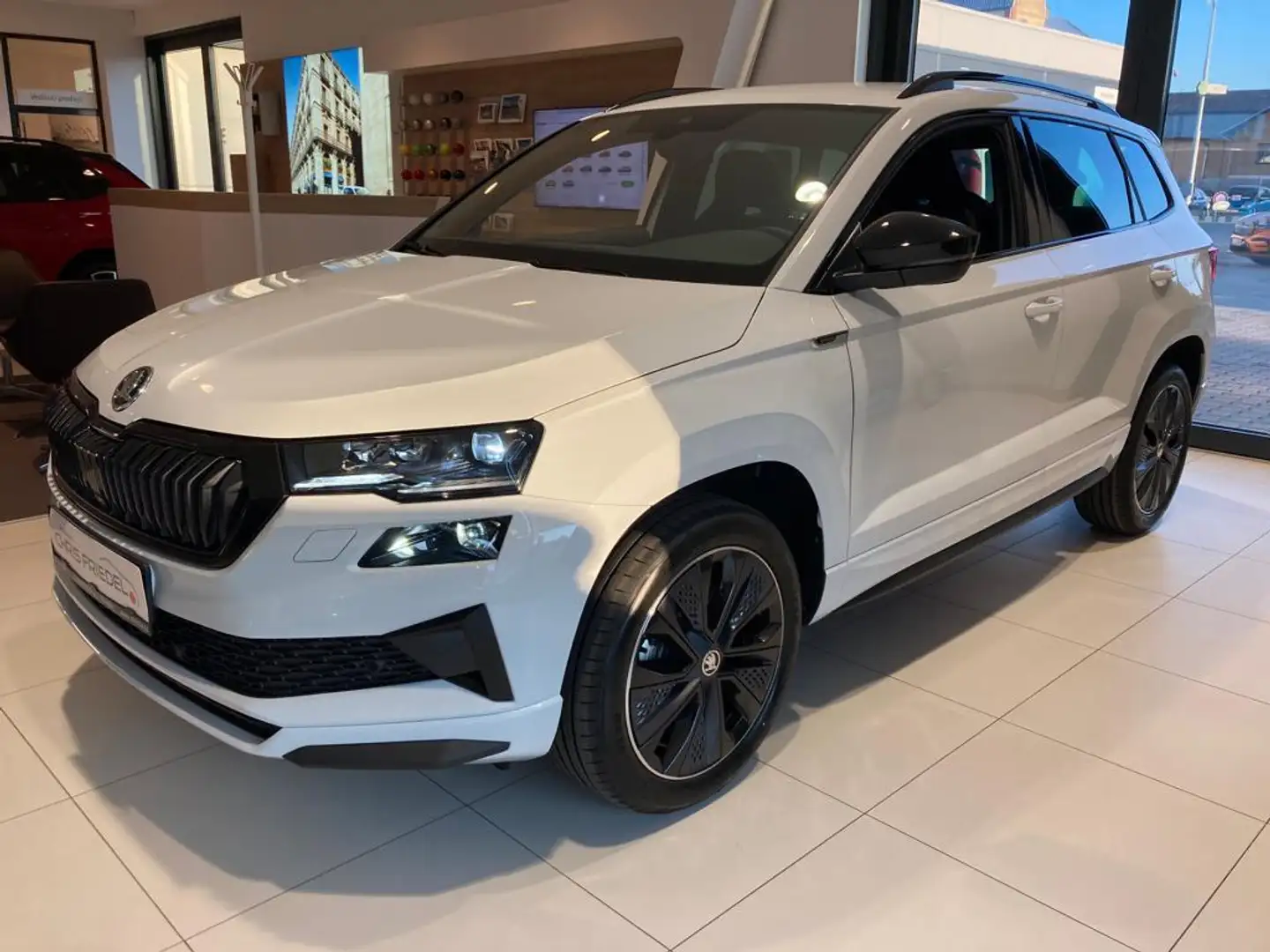 Skoda Karoq 1.5TSI Sportline DSG Matrix AHK Navi Wit - 1