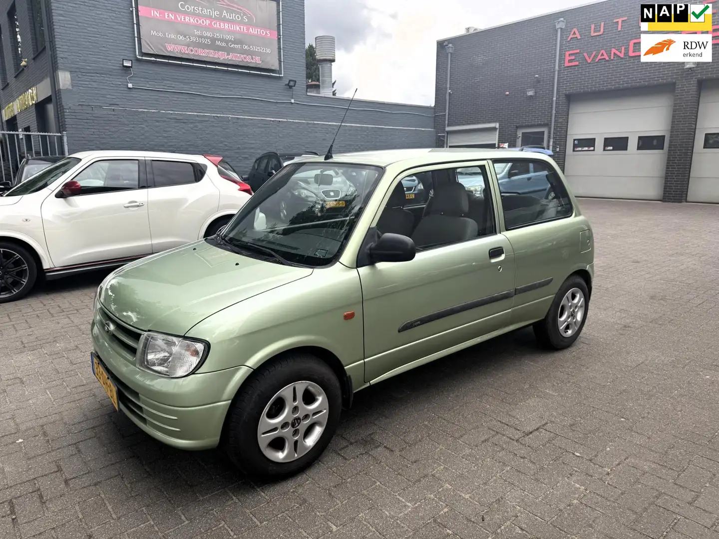 Daihatsu Cuore 1.0-12V XTi -APK tot 24-08-2026 Groen - 1