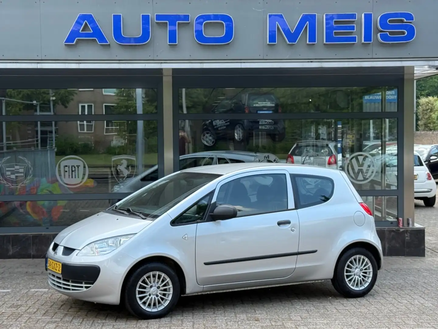 Mitsubishi Colt 1.1 Inform Airco NL-Auto NAP Grijs - 1