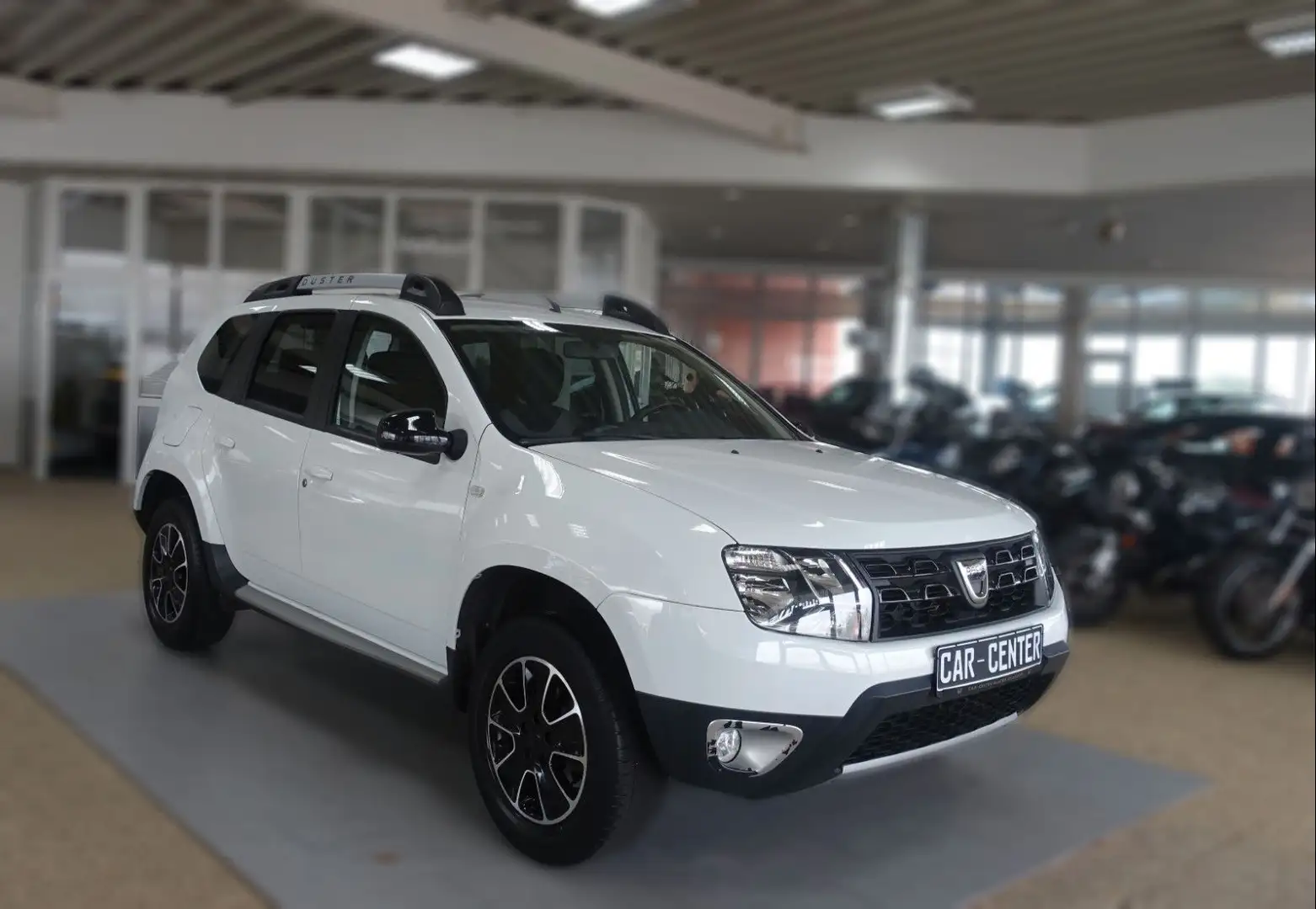 Dacia Duster SCe 115 4x2;NAV KLIMA PDC GRA AHK GJR EU6 Weiß - 1