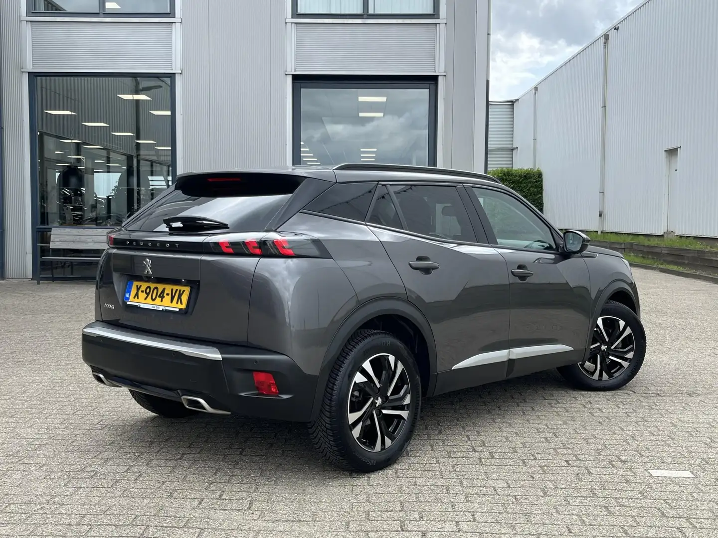 Peugeot 2008 1.2 PureTech Allure Pack | Adapt. Cruise/Clima/Sto Grijs - 2