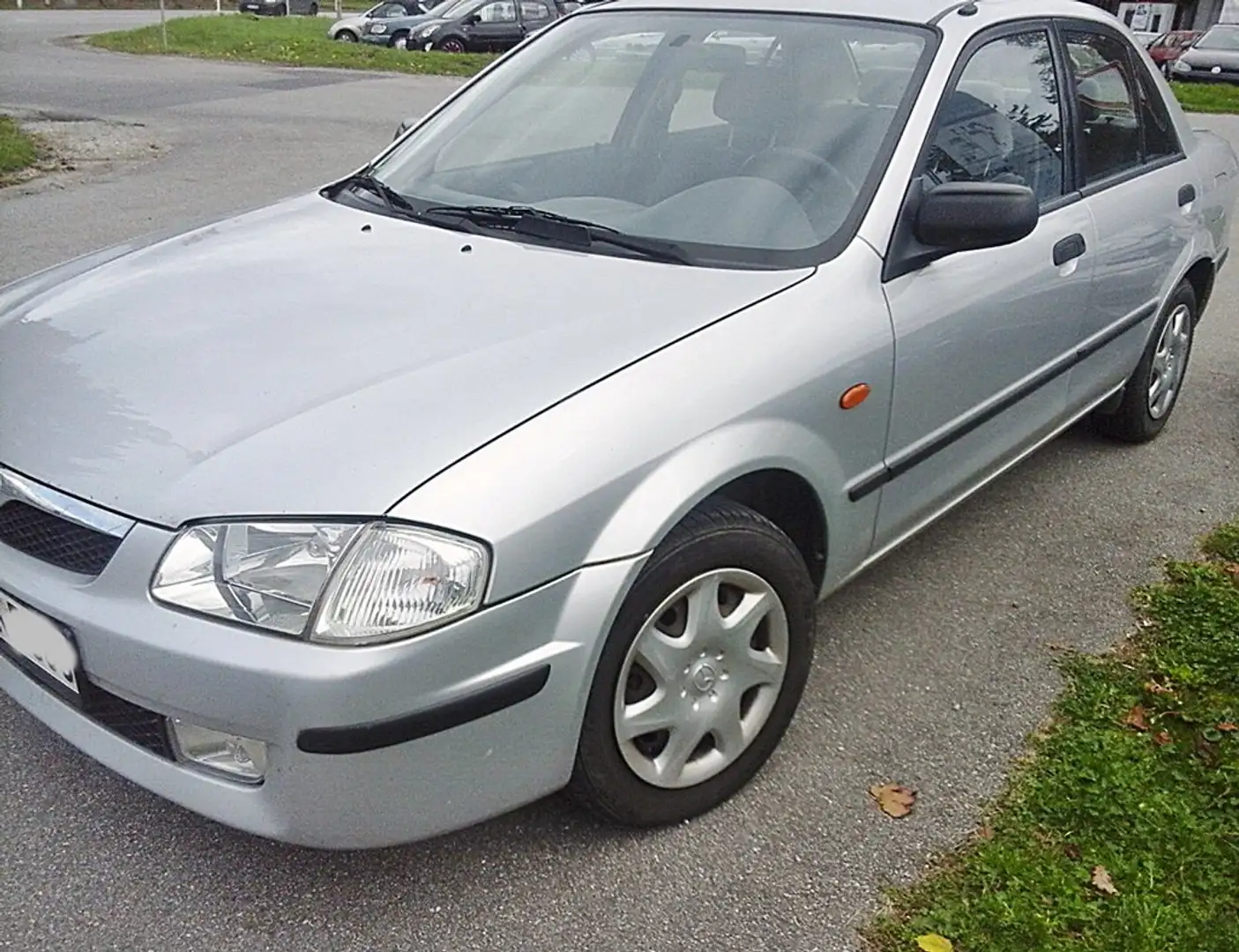 Mazda 323 S Comfort/ schöne Optik/ met+Klima+ZV/ m.TÜV Argent - 1
