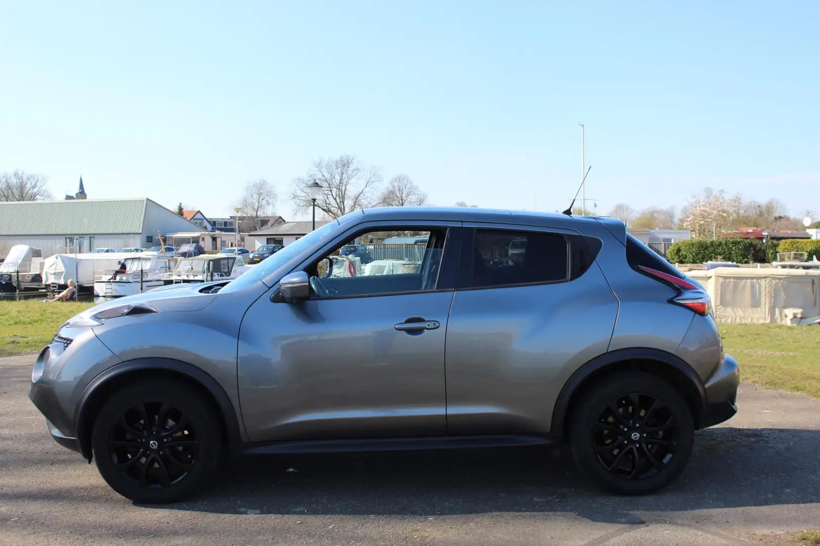 Nissan Juke 1.2 DIG-T S/S Tekna *Pano *Navi *Camera *Keyless Grijs - 2