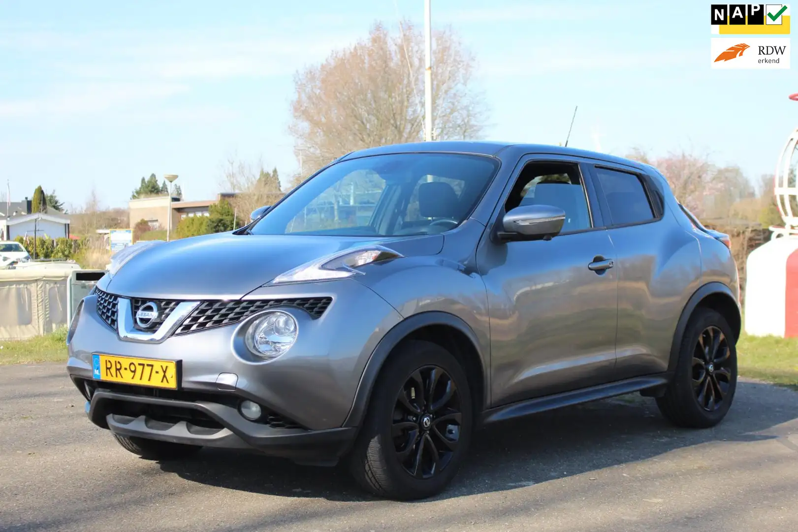 Nissan Juke 1.2 DIG-T S/S Tekna *Pano *Navi *Camera *Keyless Grijs - 1
