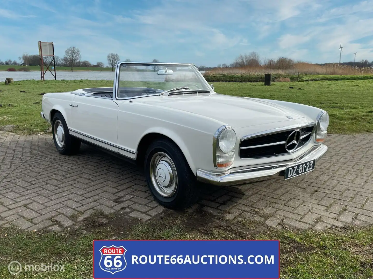 Mercedes-Benz SL 230 cabriolet | Route 66 Auctions Weiß - 1