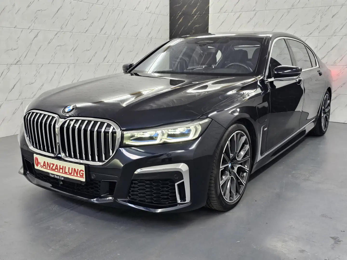BMW 745 Le xDrive+ACC+360°+Laser+Pano+Memory+H&K+TV Zwart - 1