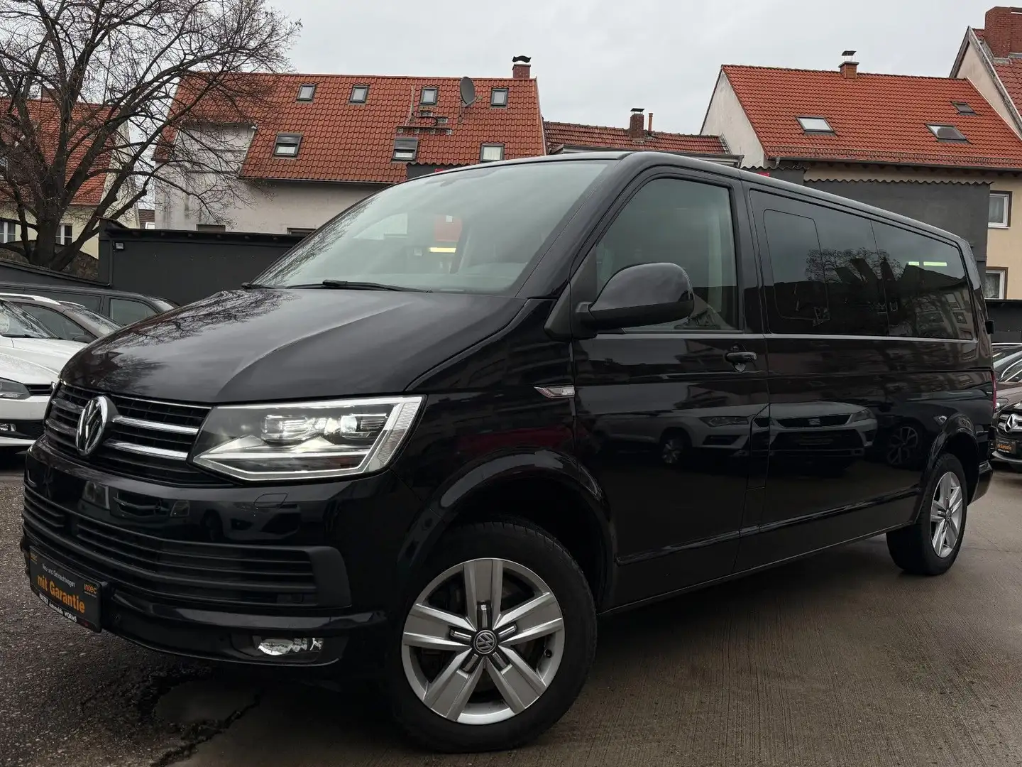 Volkswagen T6 Caravelle Lang *AUTOMATIK*9-SITZER*AHK*PDC Schwarz - 1