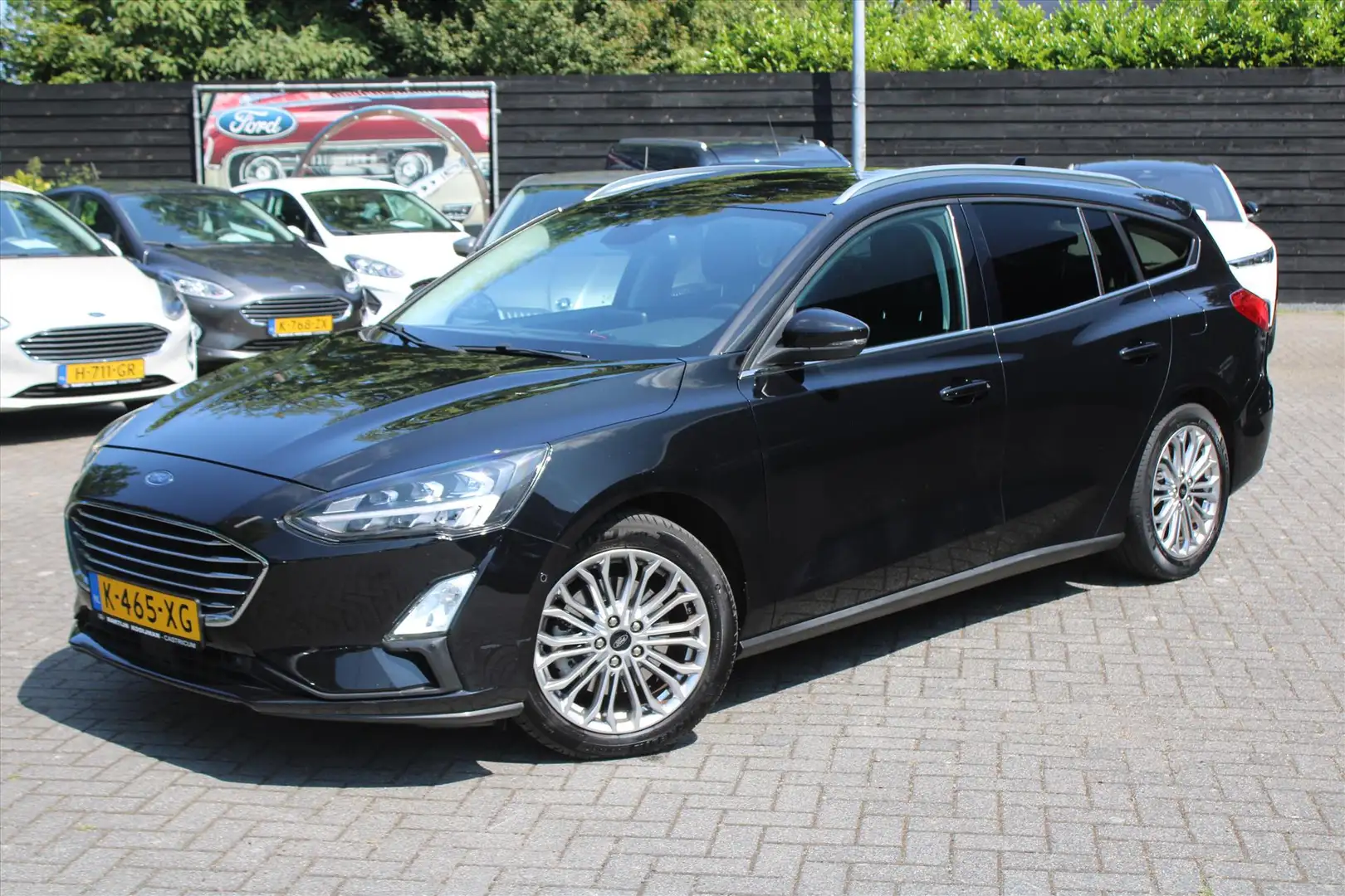 Ford Focus 1.0 EcoBoost 125pk Titanium Business Wagon, Trekha Zwart - 1