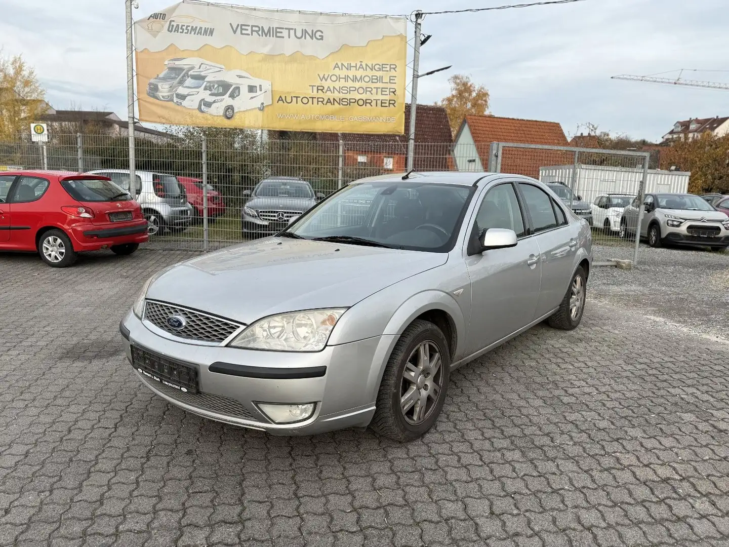 Ford Mondeo 2.0i Lim. Ghia Klimaauto SHZ Tempomat AHK Silber - 1