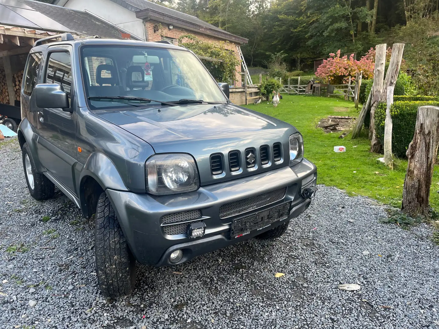 Suzuki Jimny Jimny 1.3i JLX X-Citement Gris - 1