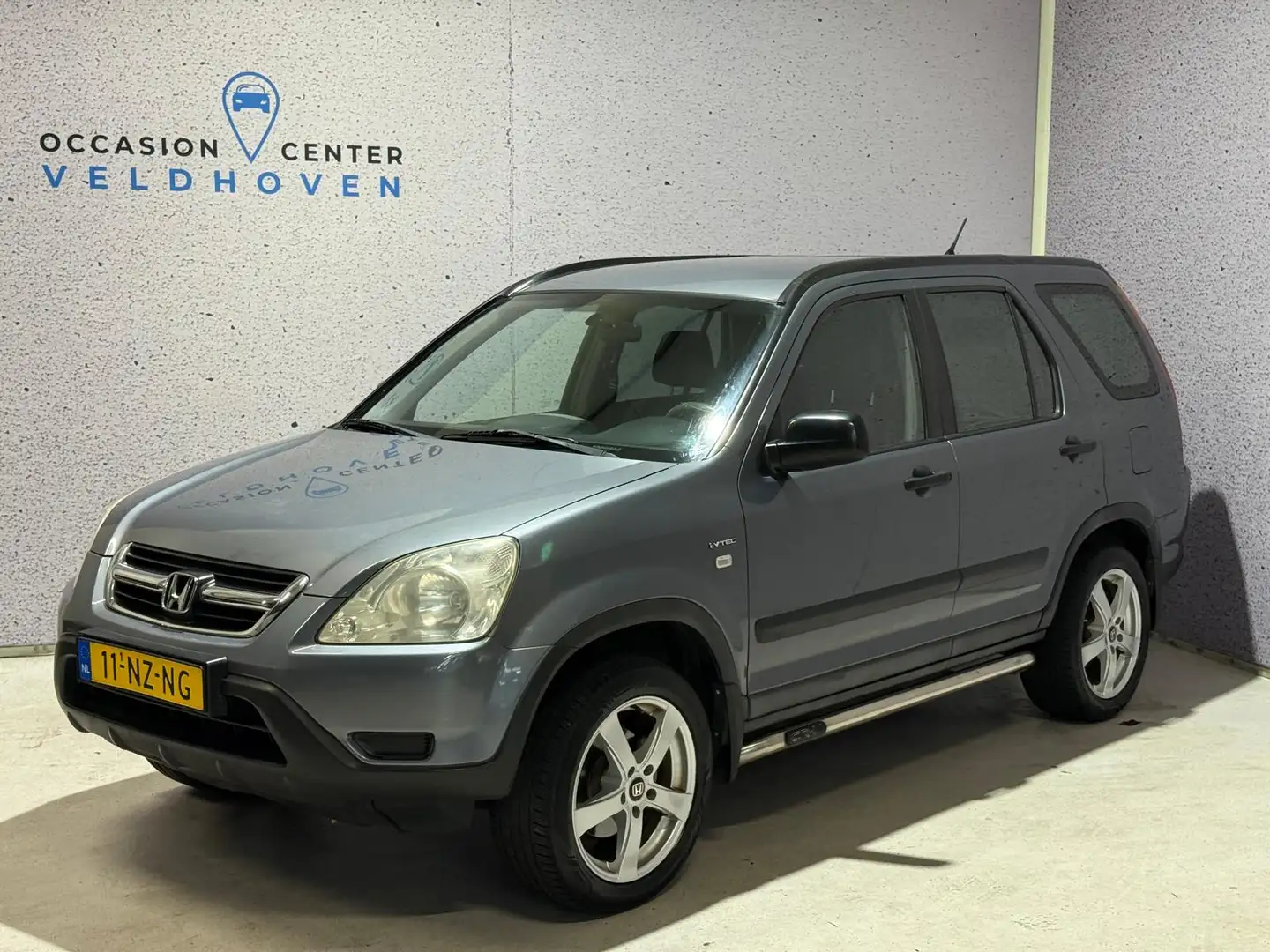 Honda CR-V AWD 2.0i LS // APK 05-12-2026 Grijs - 1