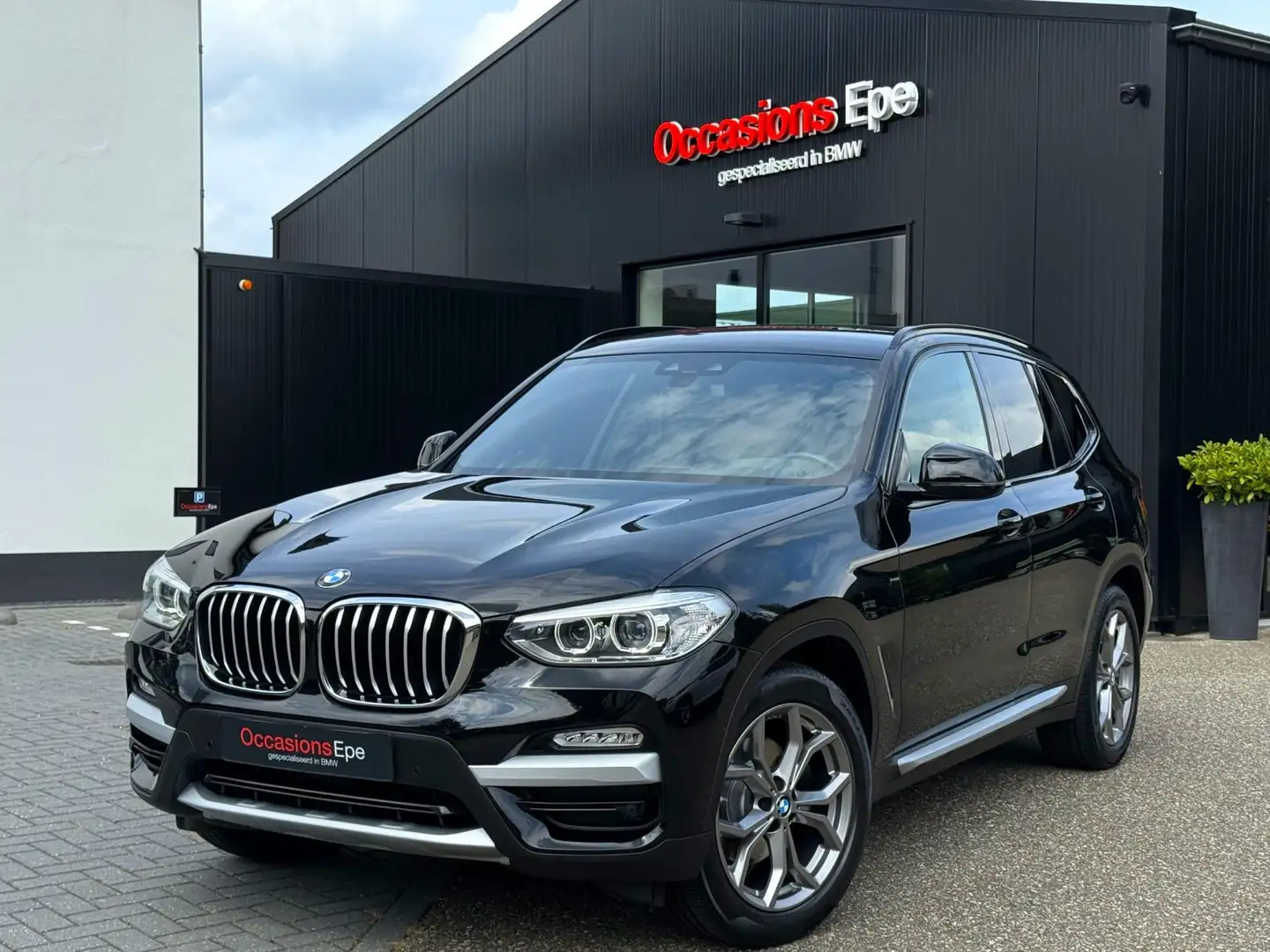 BMW X3 XDrive20i X-Line Shadowline 1e eigenaar NL Auto Noir - 1