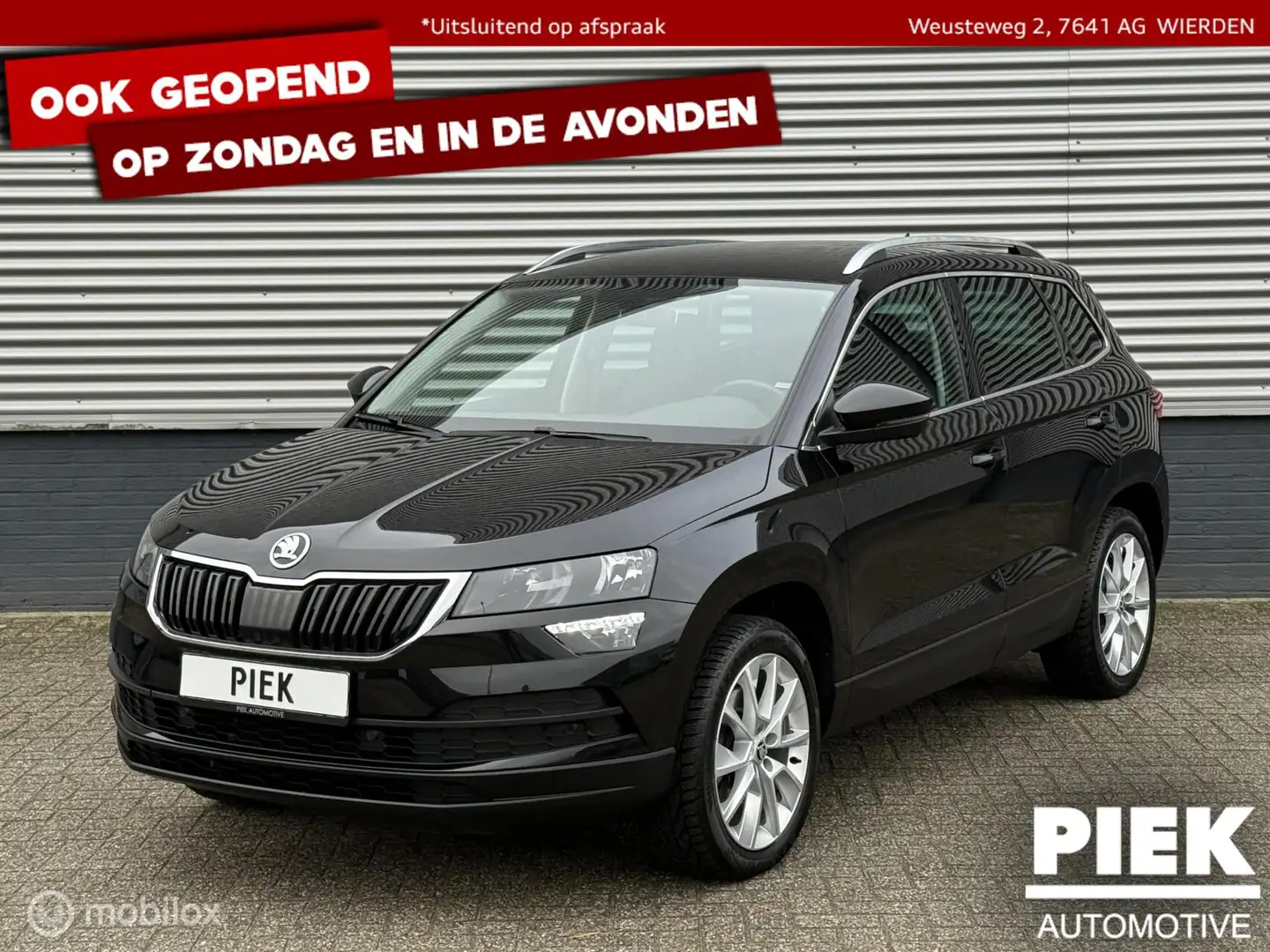 Skoda Karoq 1.0 TSI Style NIEUWSTAAT Zwart - 1
