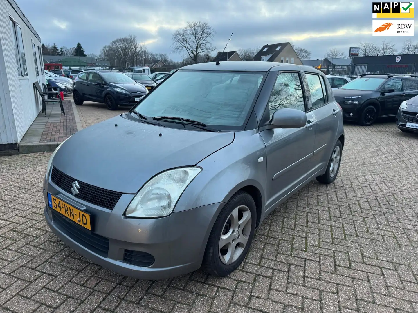 Suzuki Swift 1.5 GLS AIRCO NAP APK 07-2026 Gris - 1