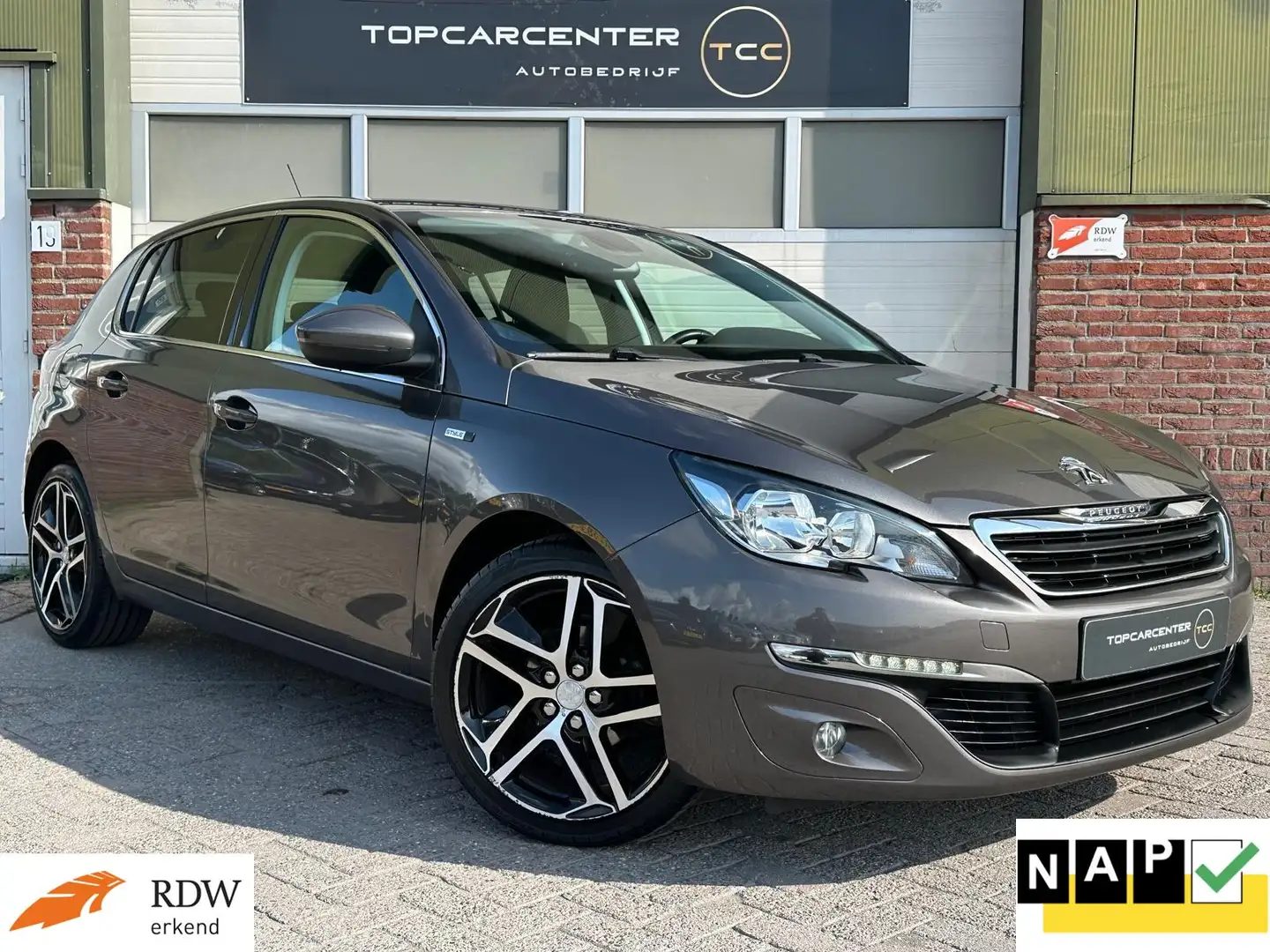 Peugeot 308 1.2 Pure Style/AIRCO/PARKS/NAVI/CRUISE/APK/NAP Grigio - 1