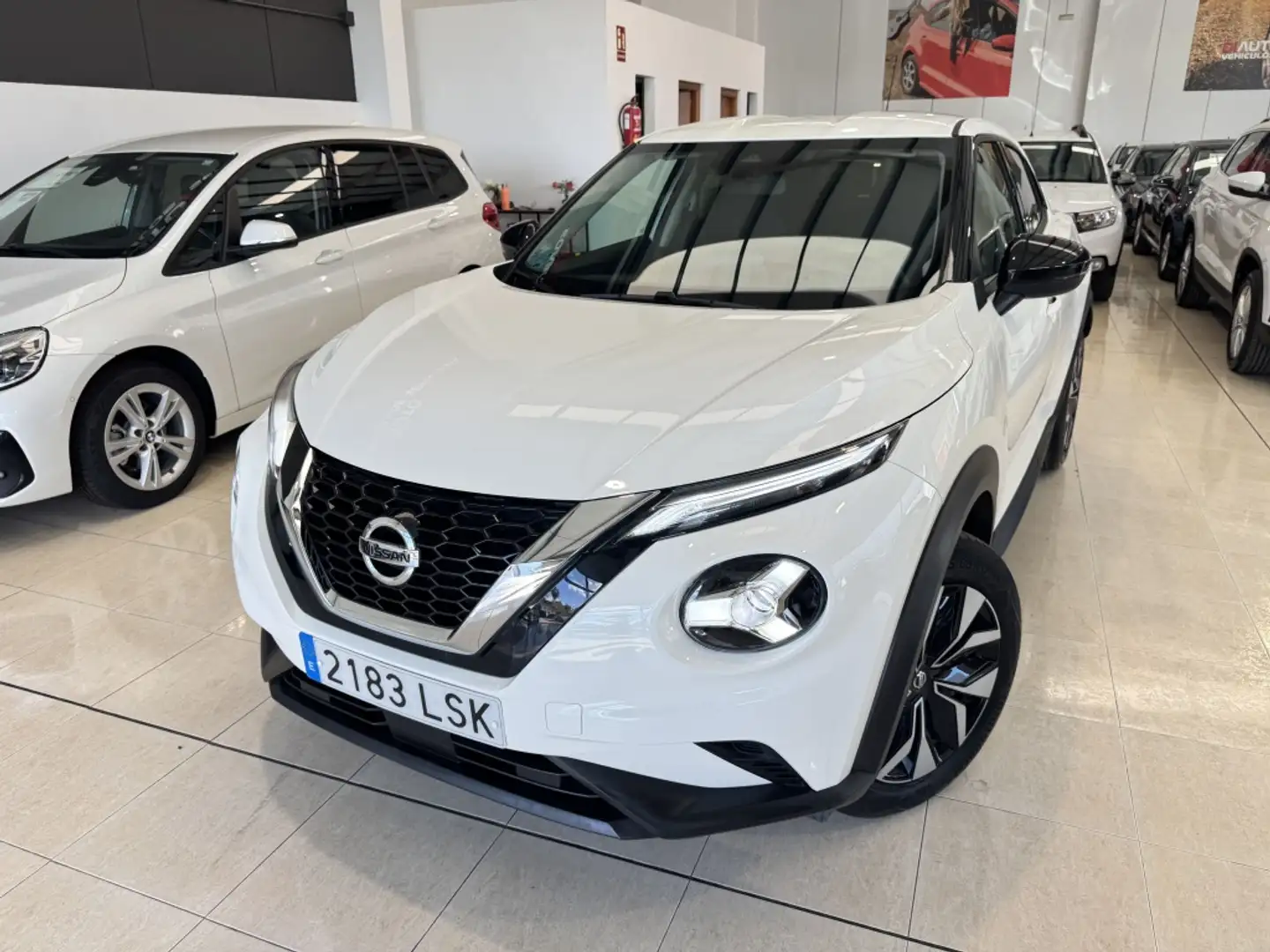 Nissan Juke 1.0 DIG-T Acenta 4x2 114 Weiß - 1