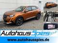 Peugeot 2008 1.2 PureTech 130  Allure RKam Tmat TLeder CarPlay Oranje - thumbnail 1