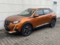 Peugeot 2008 1.2 PureTech 130  Allure RKam Tmat TLeder CarPlay Oranje - thumbnail 2