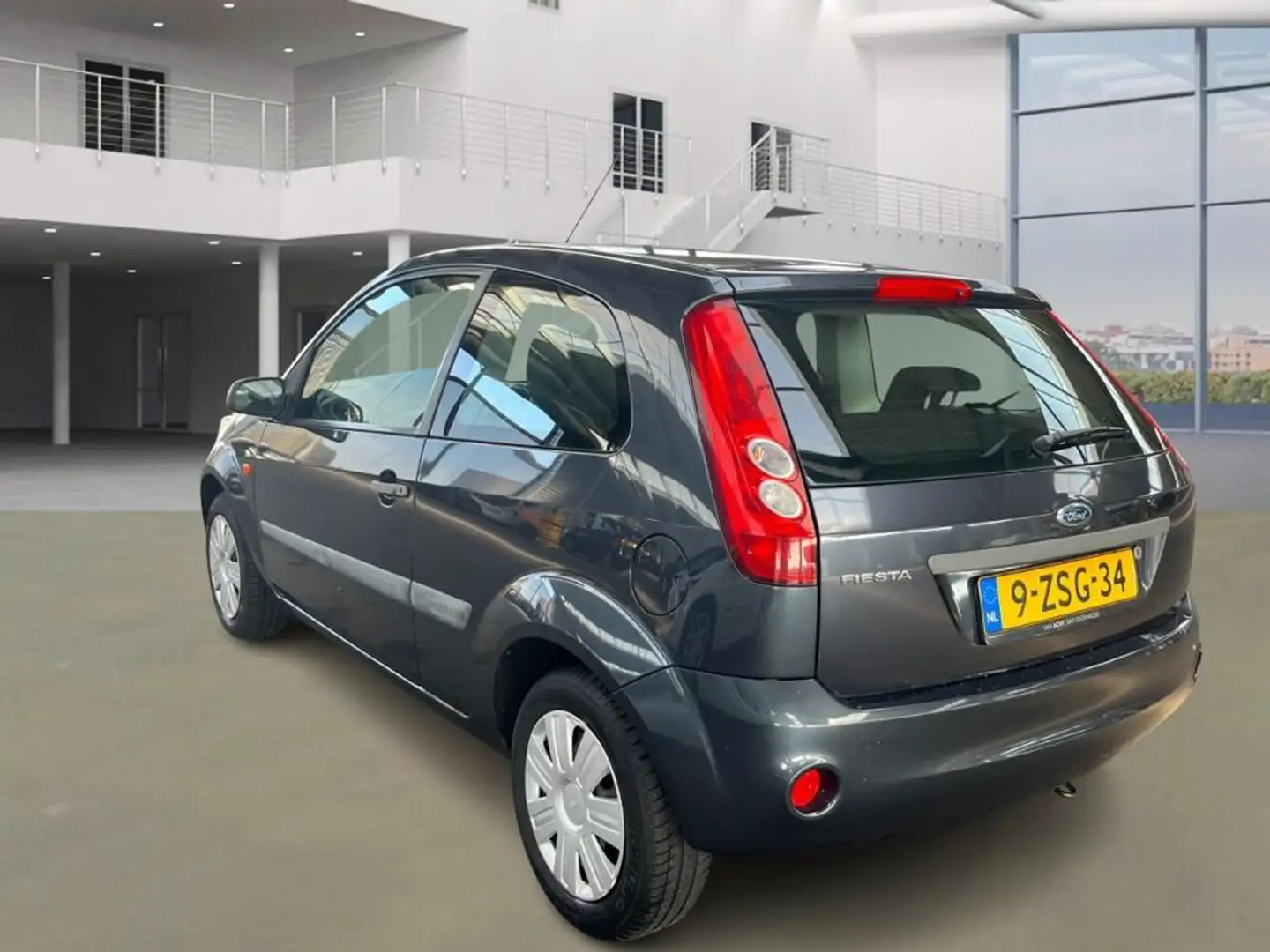 Ford Fiesta 1.4-16V Futura XL/AIRCO/ELECRAMEN VOOR Grijs - 2