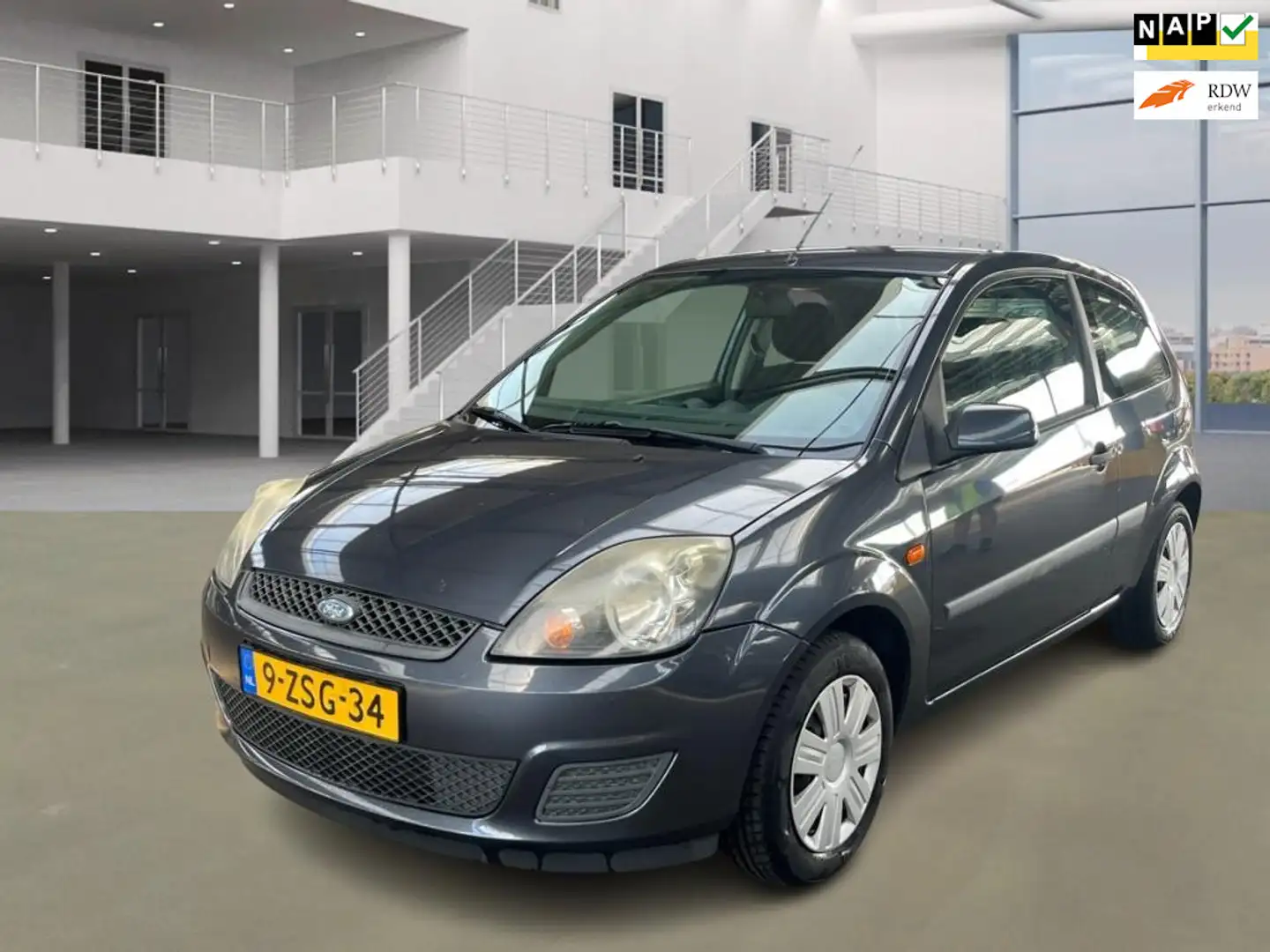 Ford Fiesta 1.4-16V Futura XL/AIRCO/ELECRAMEN VOOR Grijs - 1