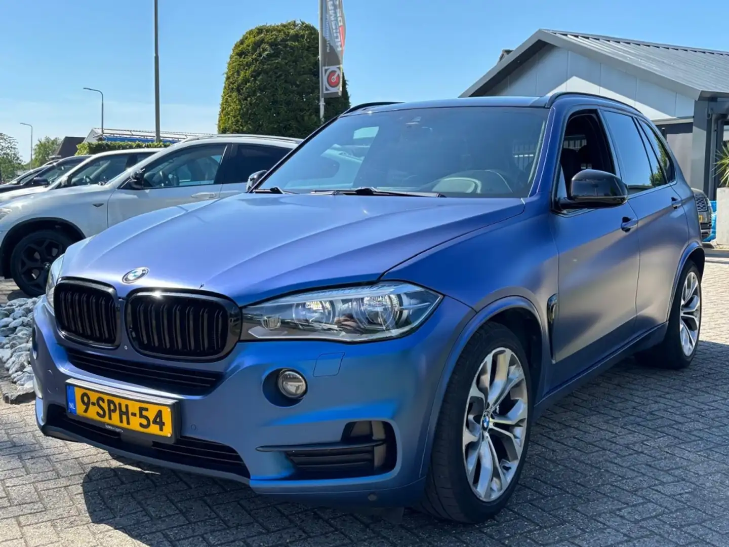 BMW X5 5.0I V8 High Exe 2013 7-Persoons VOL Braun - 1