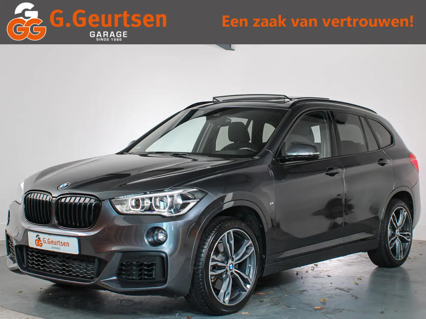 BMW X1 sDrive20i High Executive, M-sport, Panoramadak, HU Grijs - 1