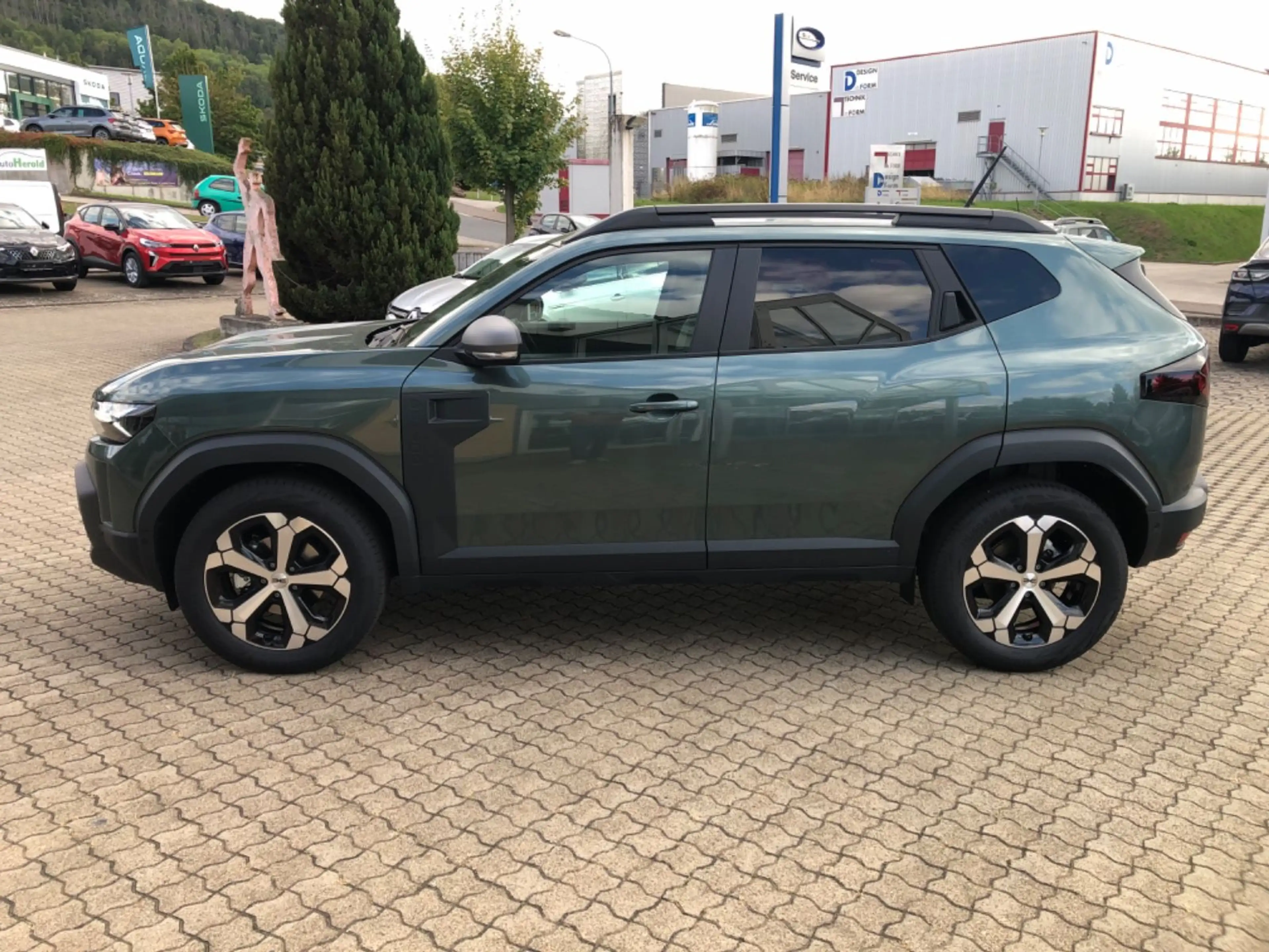 Dacia Duster III Hybrid 155 Journey — photo 11