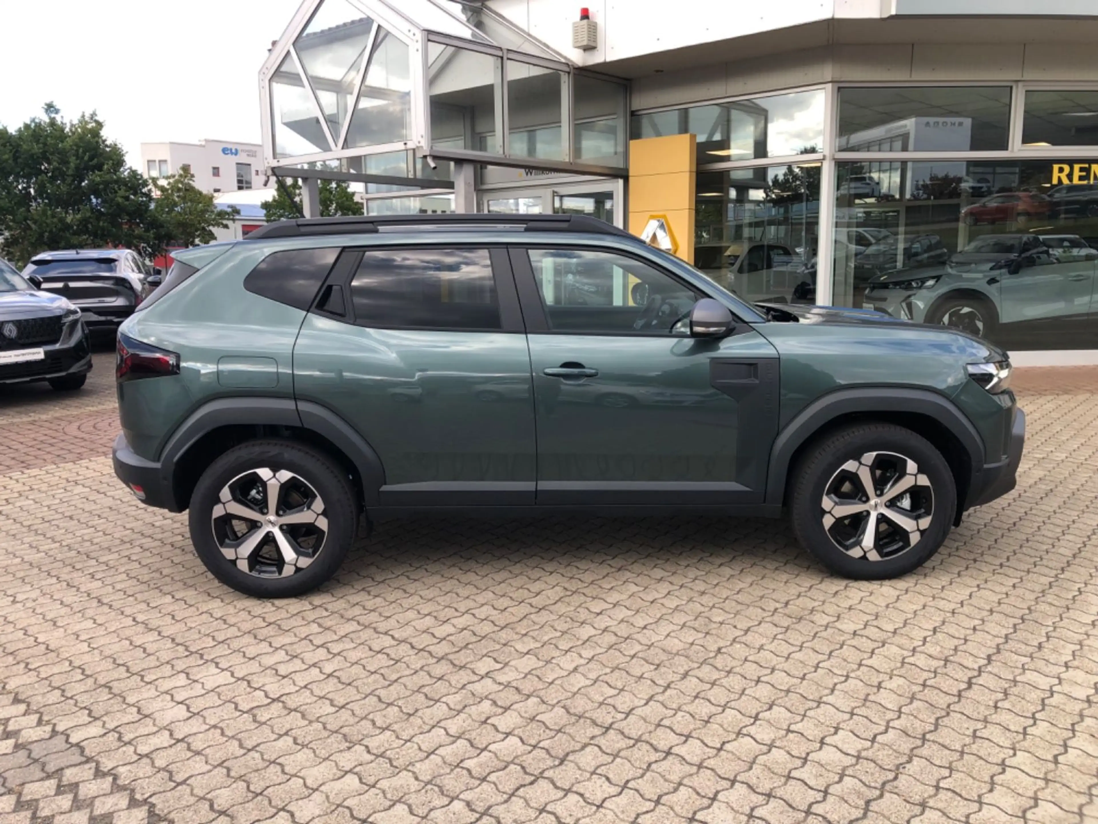 Dacia Duster III Hybrid 155 Journey — photo 15