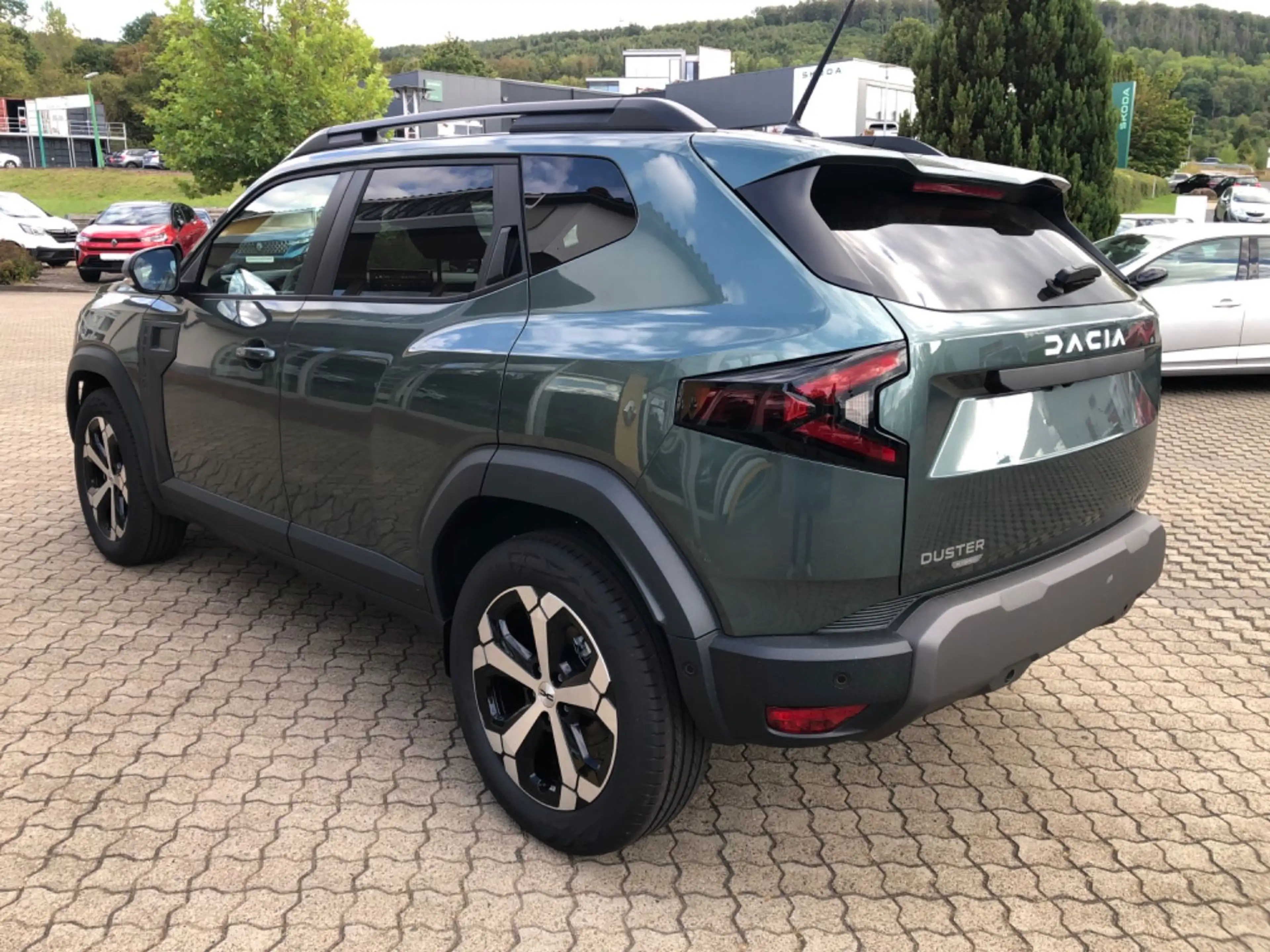 Dacia Duster III Hybrid 155 Journey — photo 12