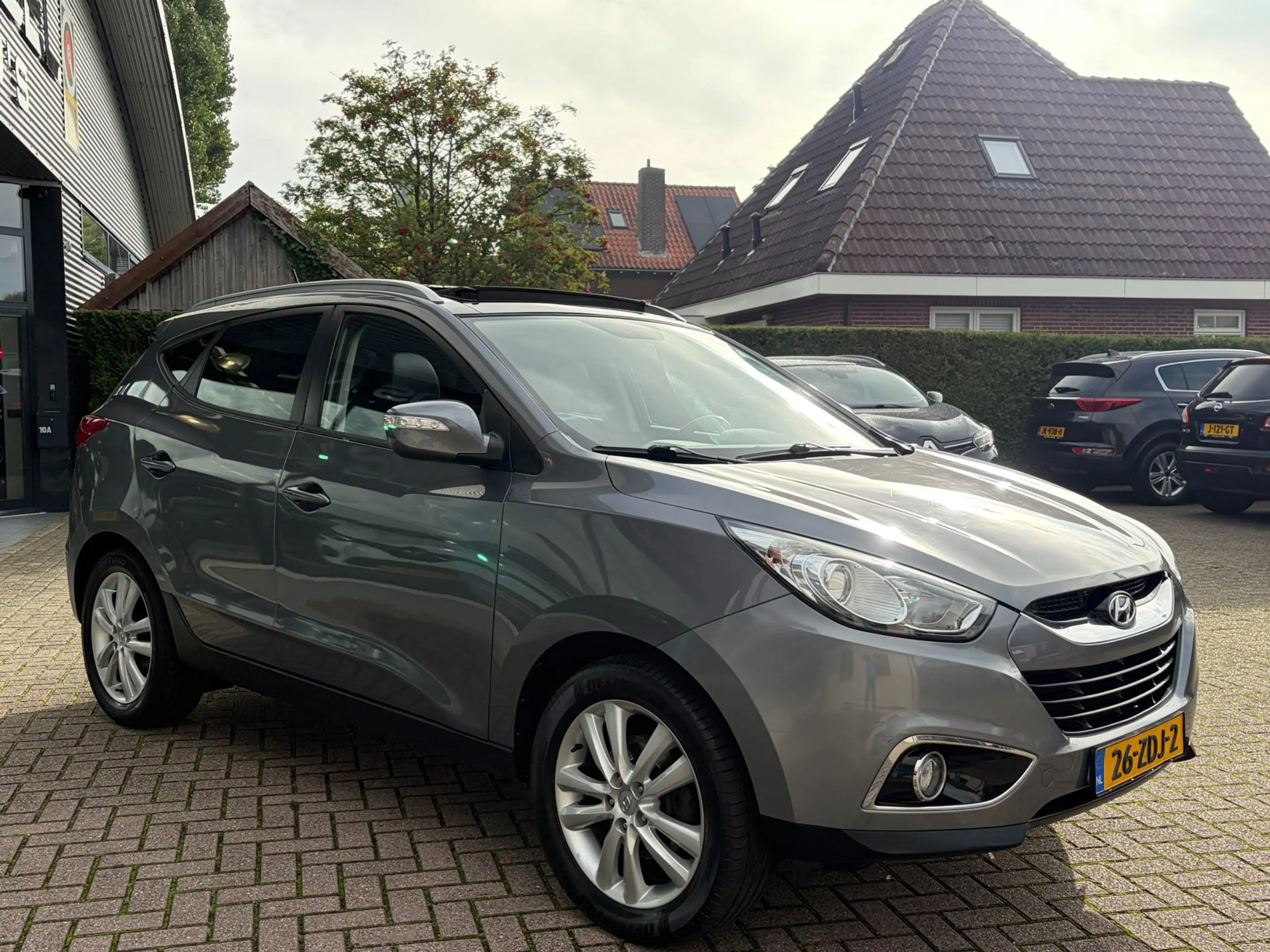 Hyundai iX35 2.0i i-Catcher Aut. Panorama Leer Navi Clima Cruis — photo 6