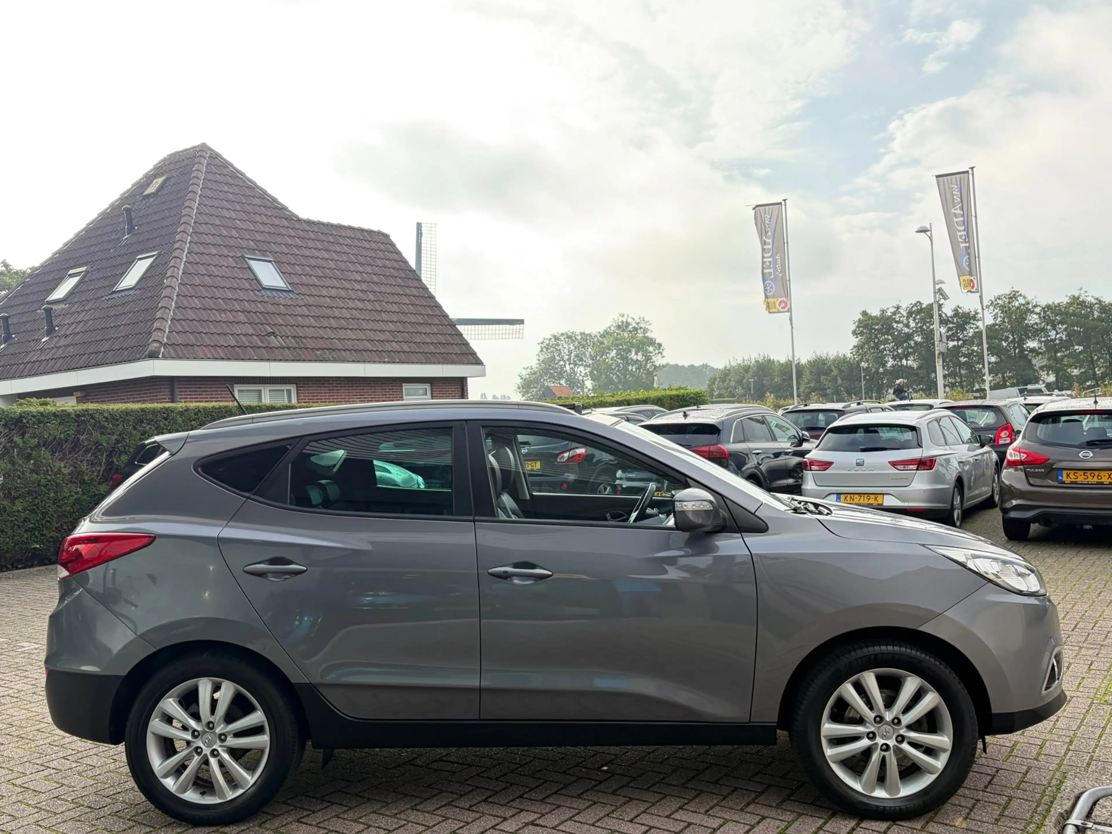 Hyundai iX35 2.0i i-Catcher Aut. Panorama Leer Navi Clima Cruis — photo 5
