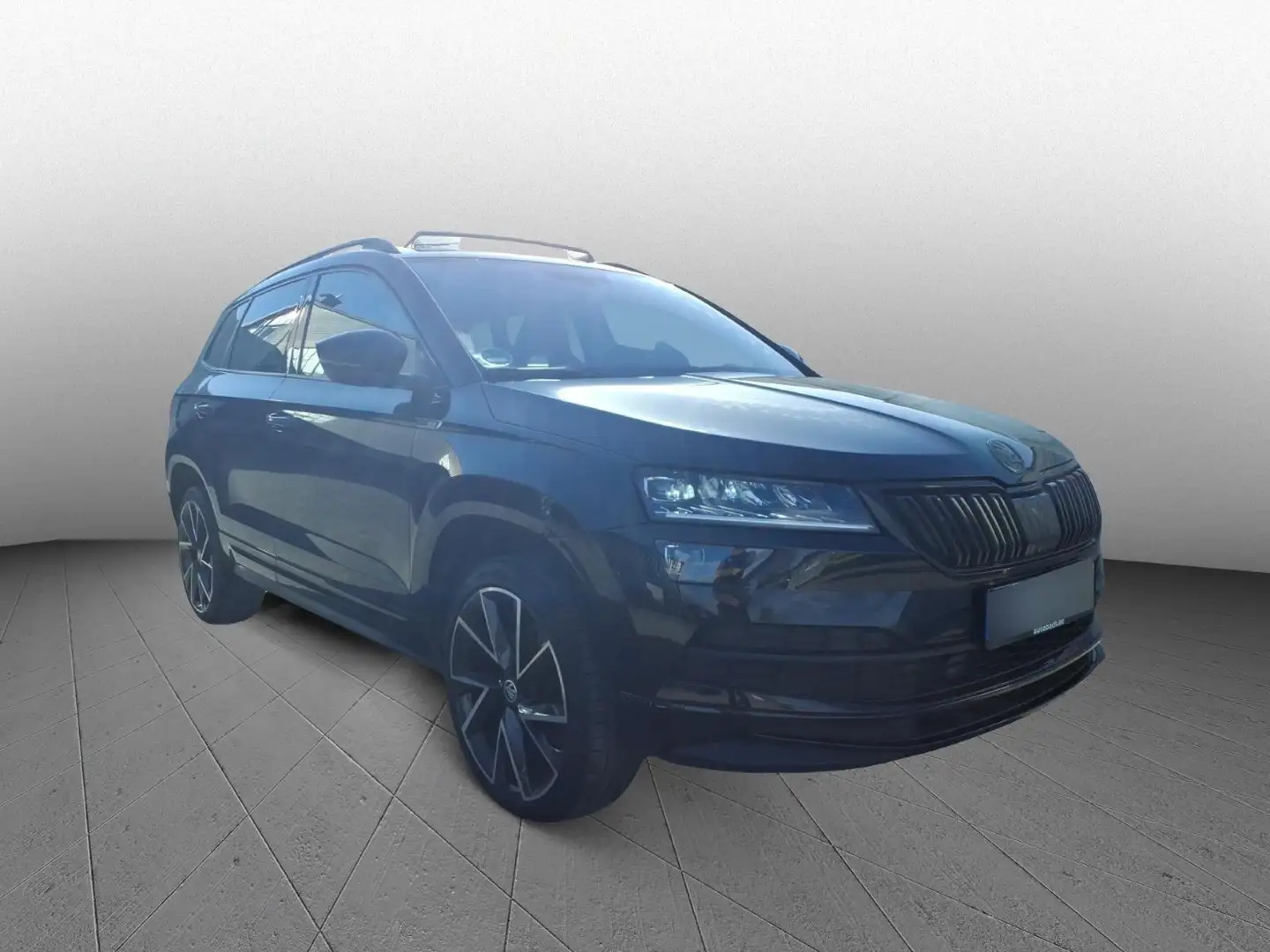 Skoda Karoq Sportline 1.5 TSI 110kW Panorama GRA Canto Zwart - 1