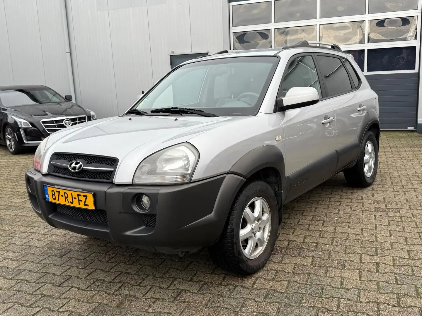 Hyundai TUCSON 2.0i Dynamic 2005 LPG-G3 99.000 KM NL auto Grau - 1