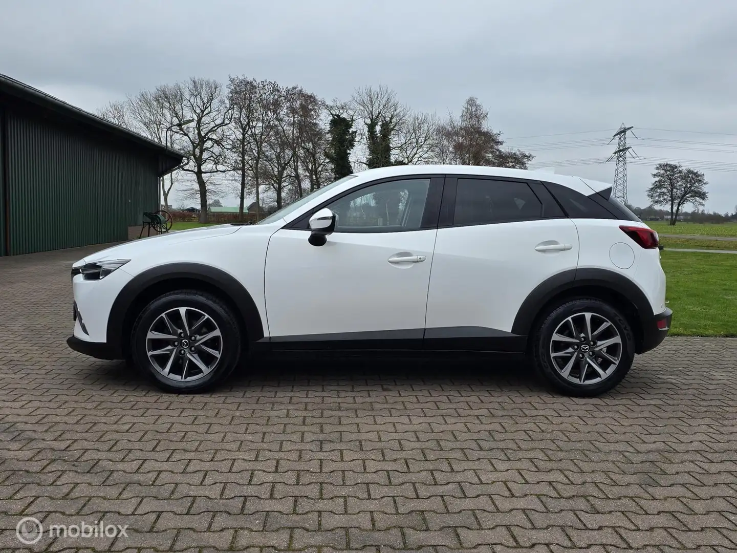 Mazda CX-3 2.0 SkyActiv-G/NAVI/PDC/150PK/4WD Weiß - 2