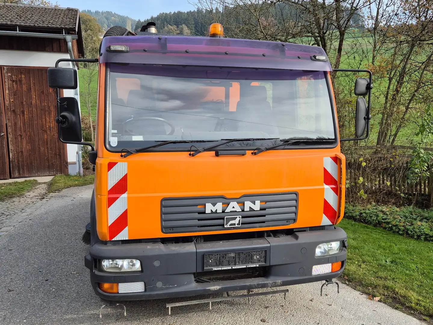 MAN L 2000 Kehrmaschine mit Johnston Aufbau Оранжевий - 2