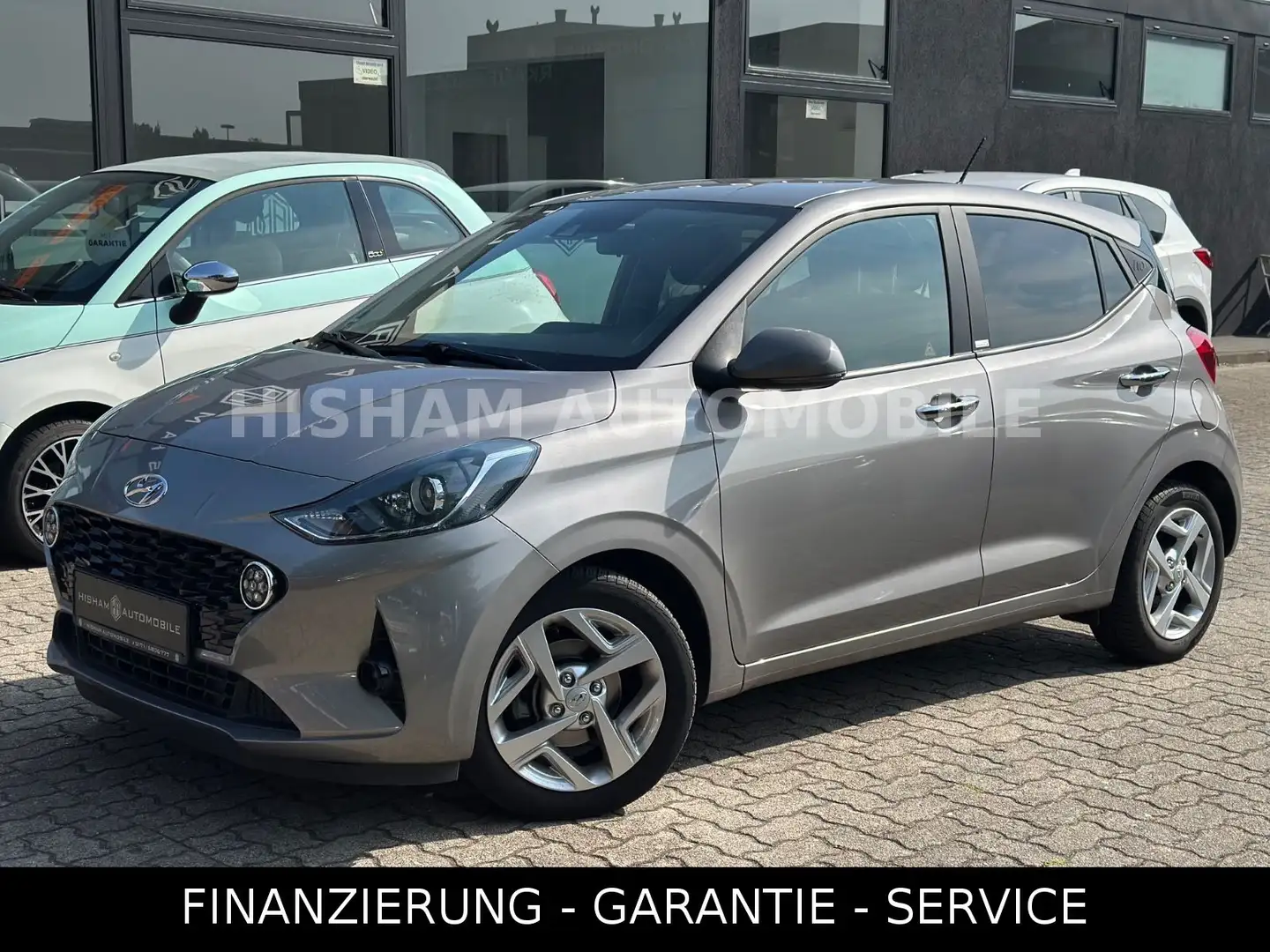 Hyundai i10 STYLE 1,2 AUTOMATIK/NAVI/KAMERA/SHZ/ALU/MFL Grau - 1