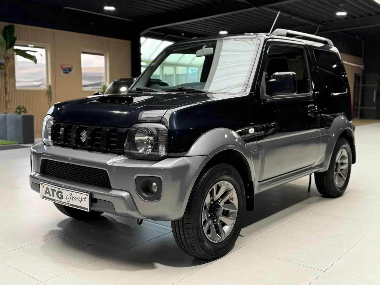Suzuki Jimny 1.3i JLX DAKOTA 4X4 CUIR AIRCO JANTE Schwarz - 1