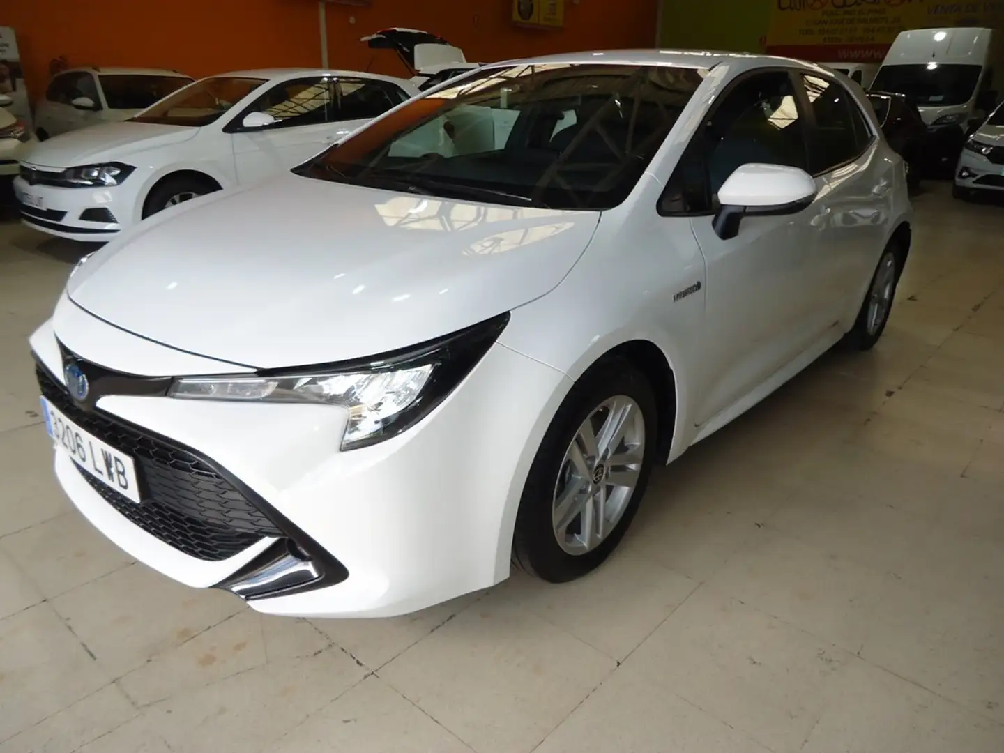 Toyota Corolla 125H Business Weiß - 1