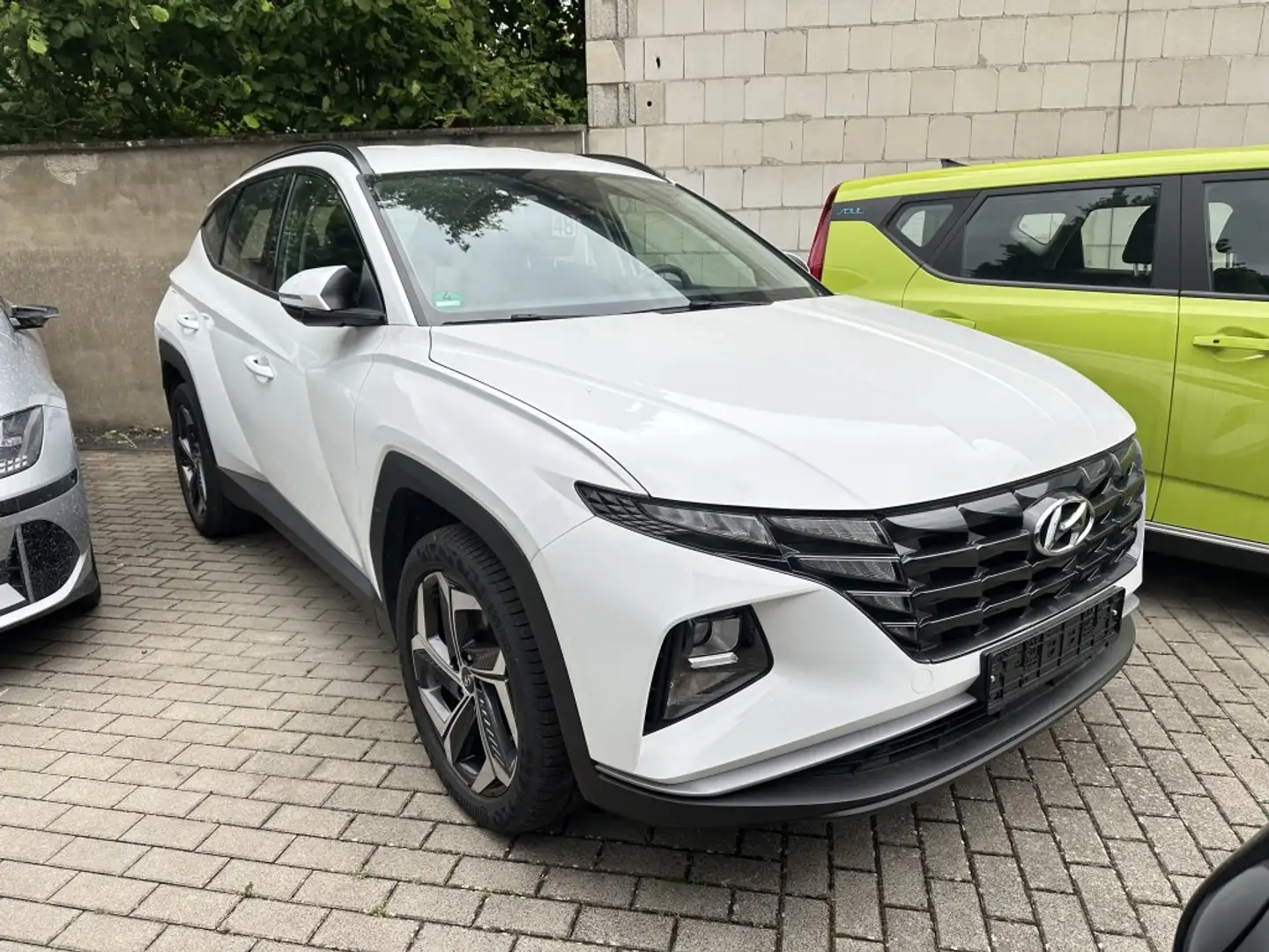 Hyundai TUCSON Plug-In*4WD*R.Cam*SHZ*DAB*digt.Cockpit Weiß - 1