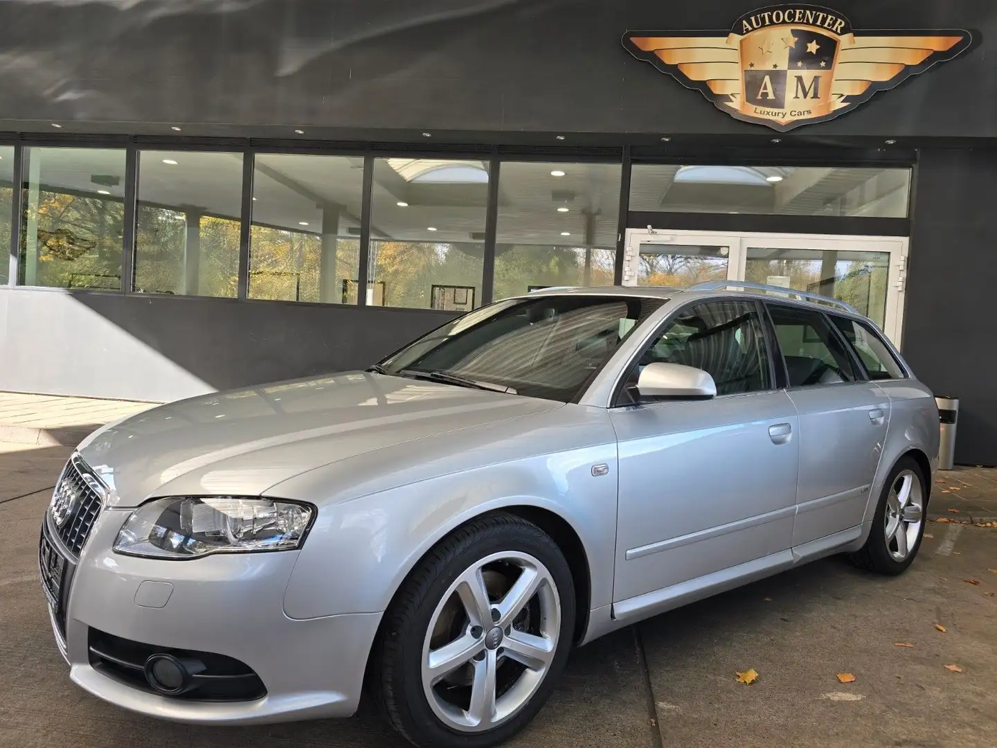 Audi A4 Avant 2.0 TDI S-Line AHK/Navi+/T-Leder/Xenon Zilver - 1
