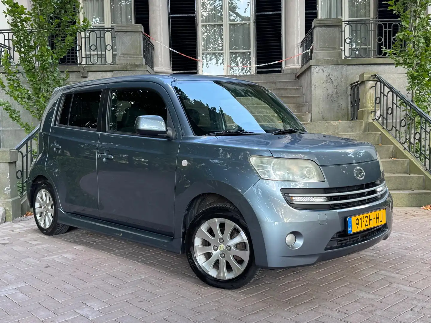 Daihatsu Materia 1.3 Funk Airco Elec Pakket Lmv AchterSpoiler Gris - 1
