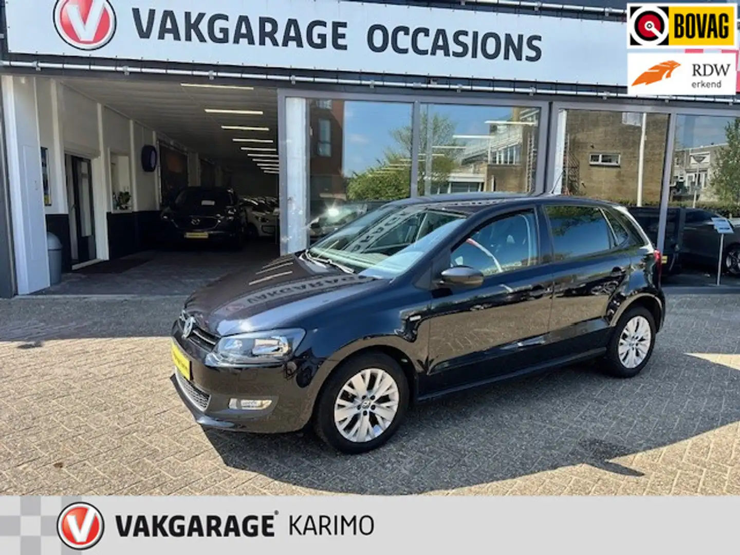 Volkswagen Polo 1.2 TSI Highline Automaat, Zwart - 1