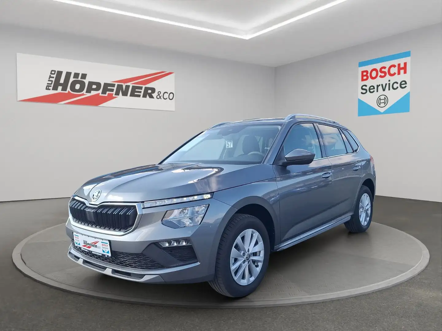 Skoda Kamiq Top Selection 1.0 TSI DSG / App / SunSet Grijs - 1