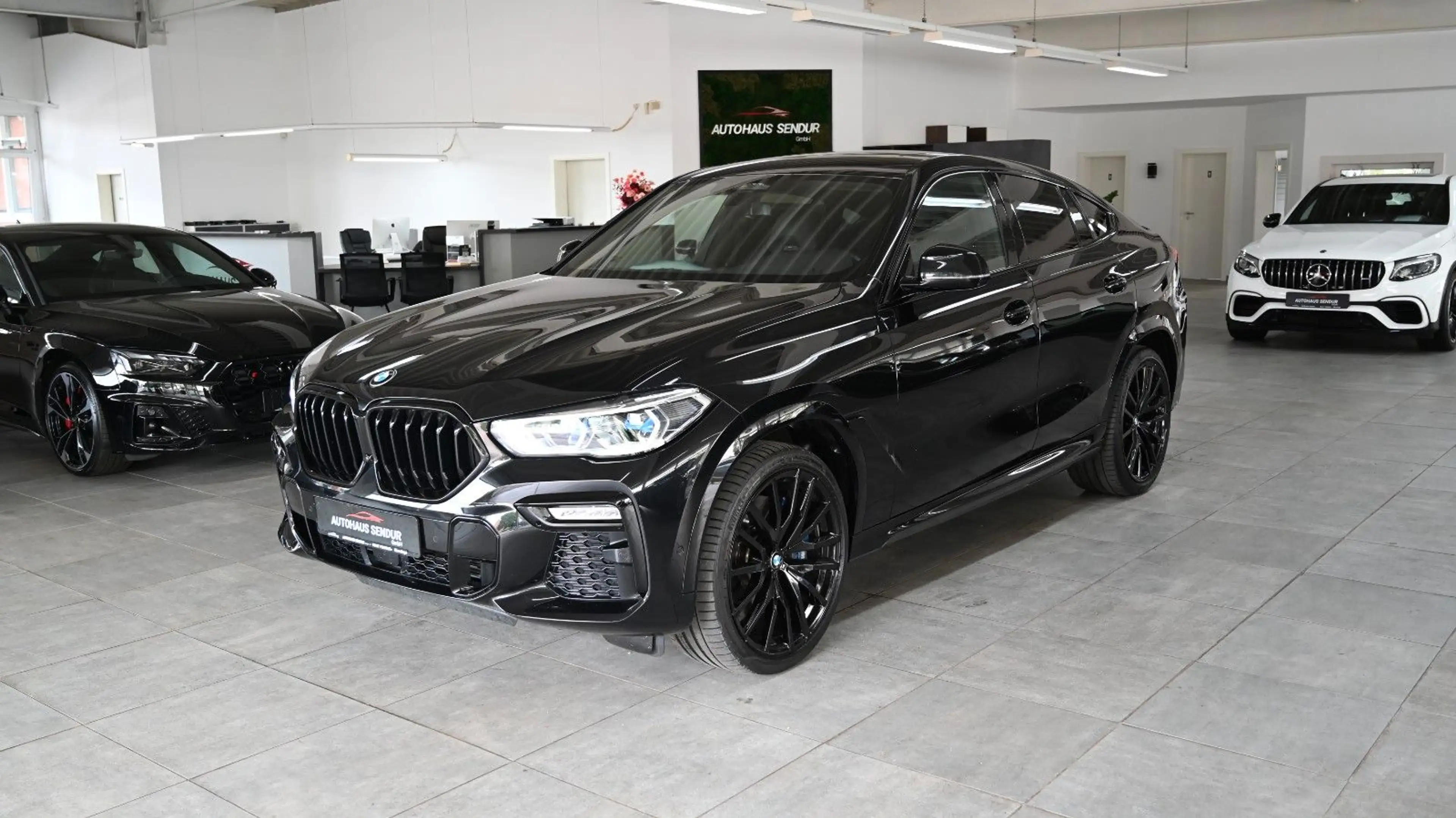 BMW X6 M50i — photo 2