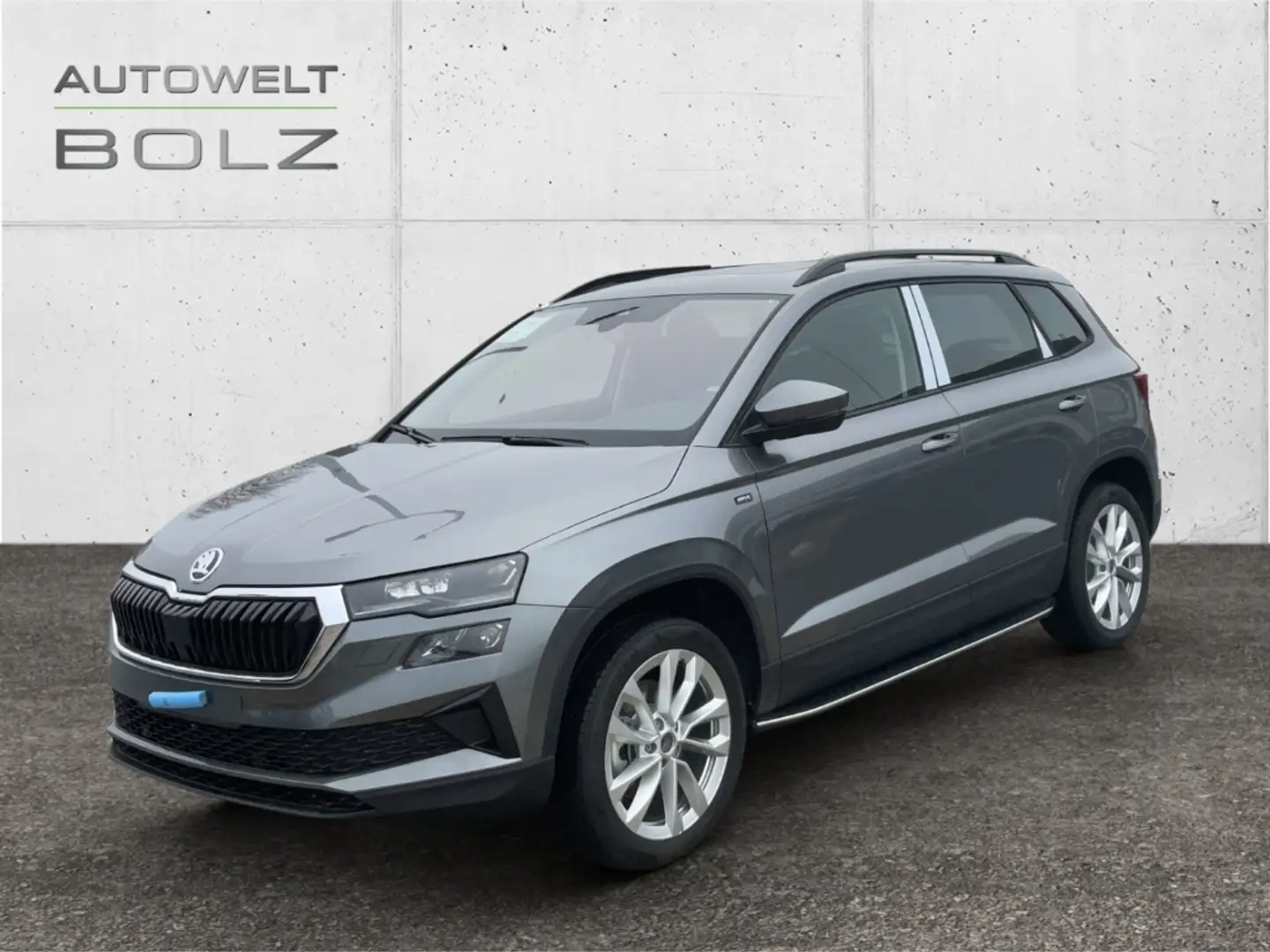 Skoda Karoq Drive 1.5 TSI AHK Pano Trittbr. Navi digiCock Cant Grau - 1