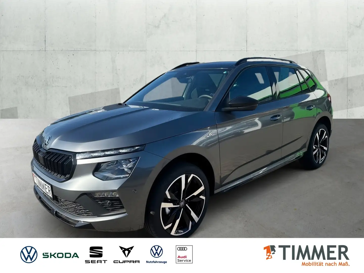 Skoda Kamiq 1,5 TSI DSG Monte Carlo AHK*Assist+*Winter+*Komf+ Grijs - 1