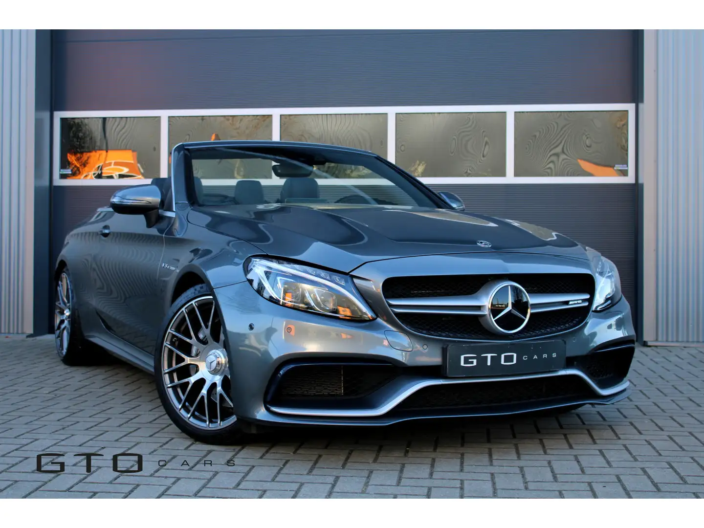 Mercedes-Benz C 63 AMG Cabrio Burmester/Surround View/HUD/Nekverwarming/N Grau - 1