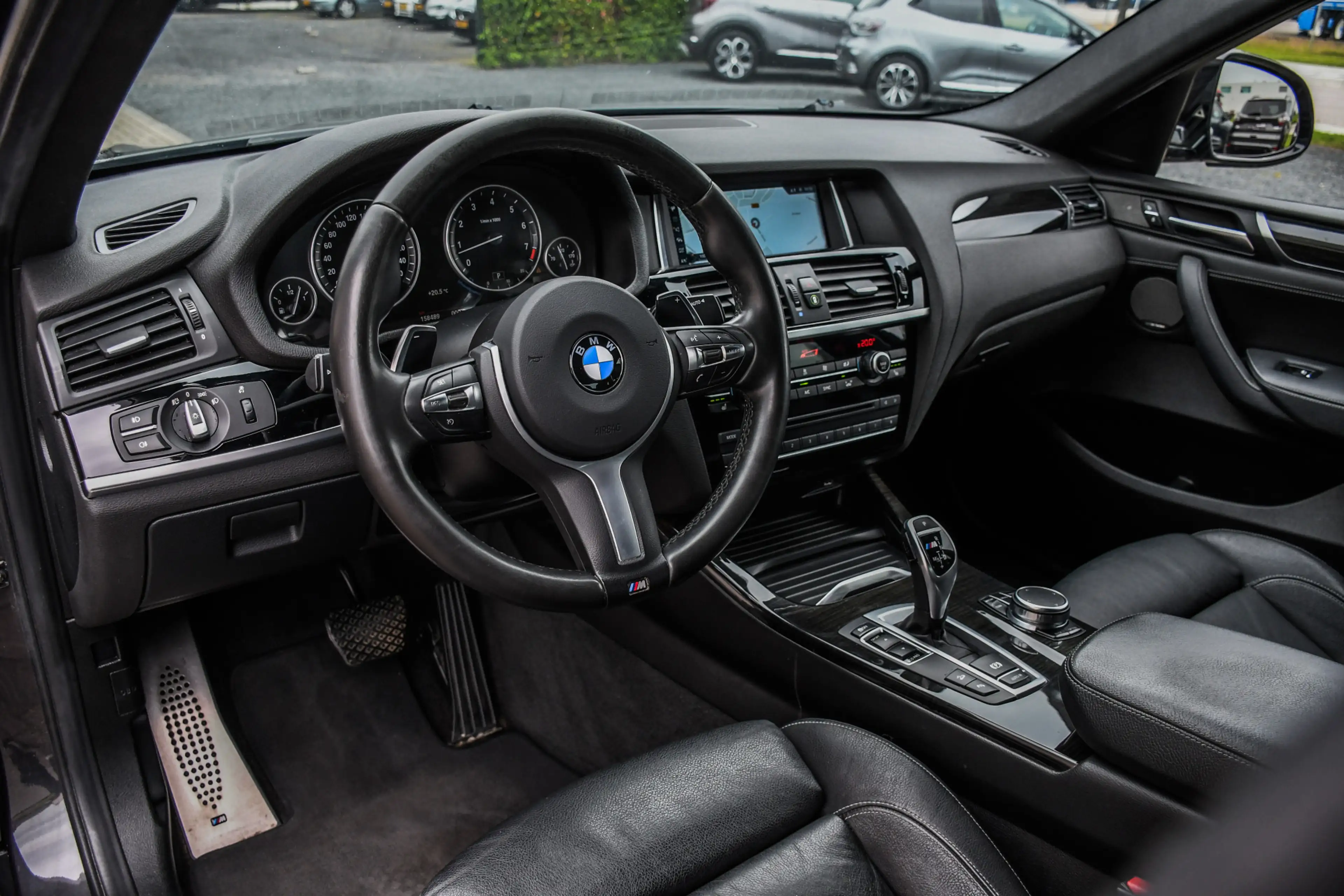BMW X4 M40i High Executive — photo 7