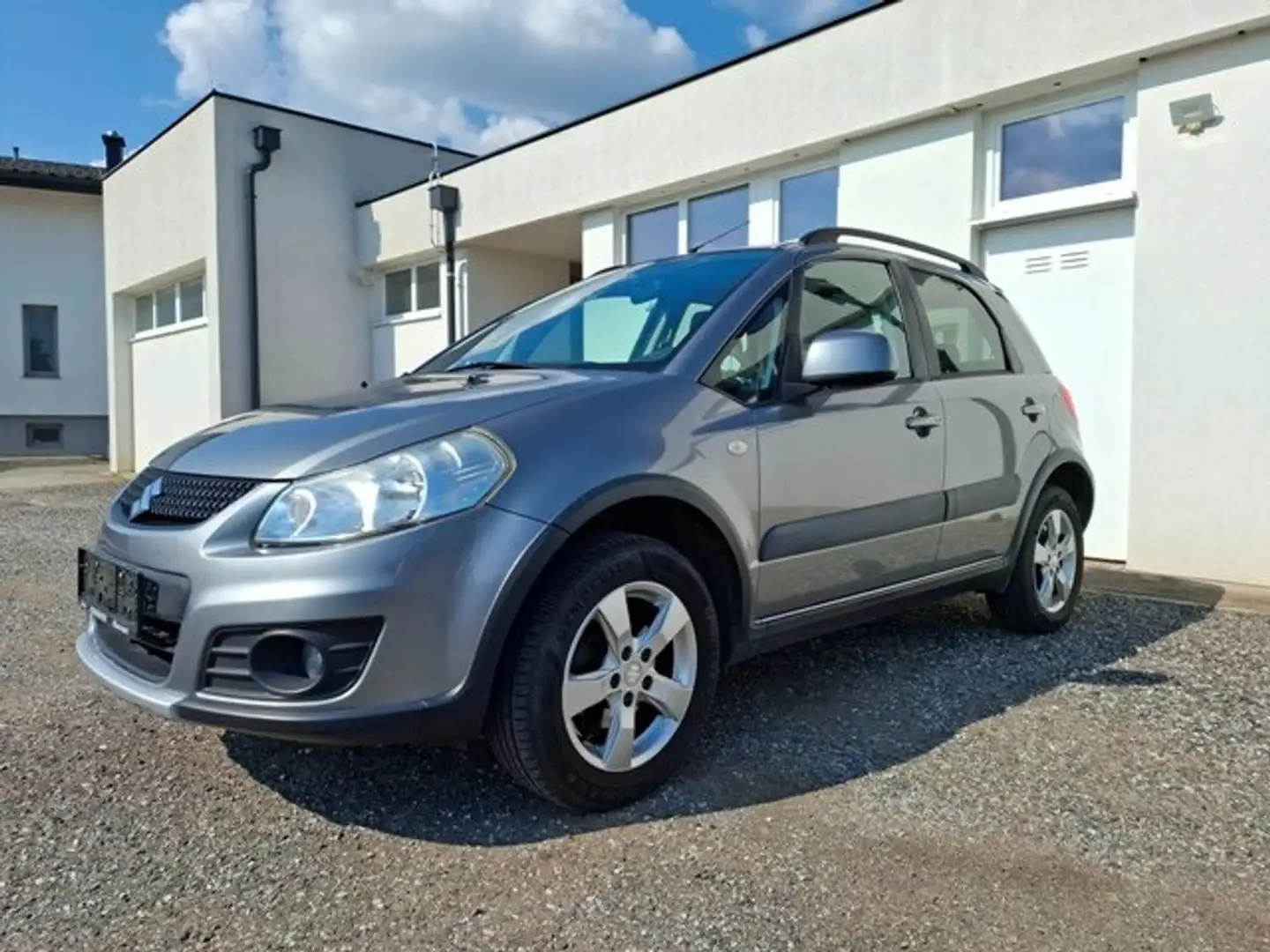 Suzuki SX4 1,6 GLX 4WD deluxe Grau - 1